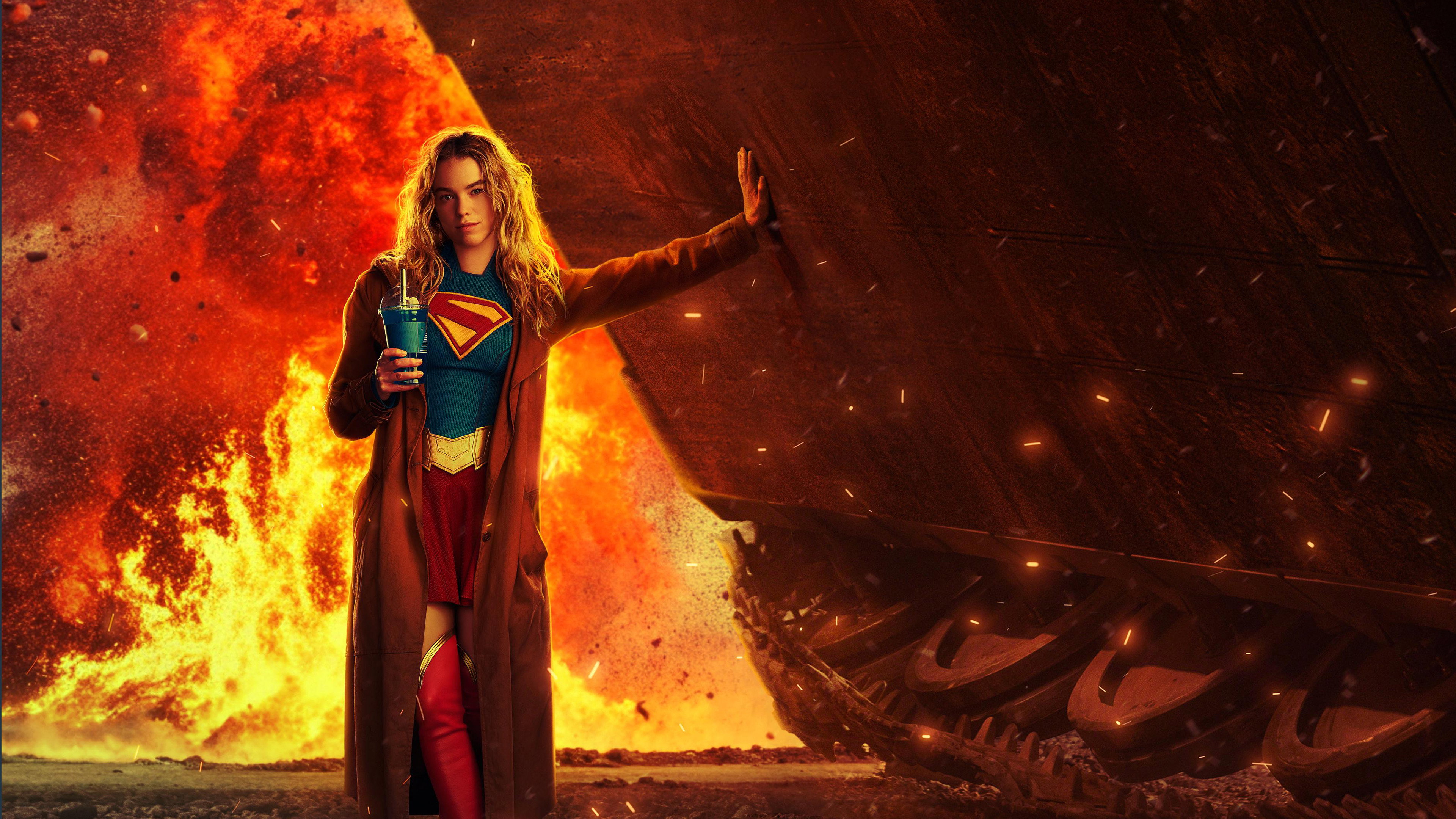 Milly Alcock as Supergirl stopping a massive vehicle HD Wallpaper
