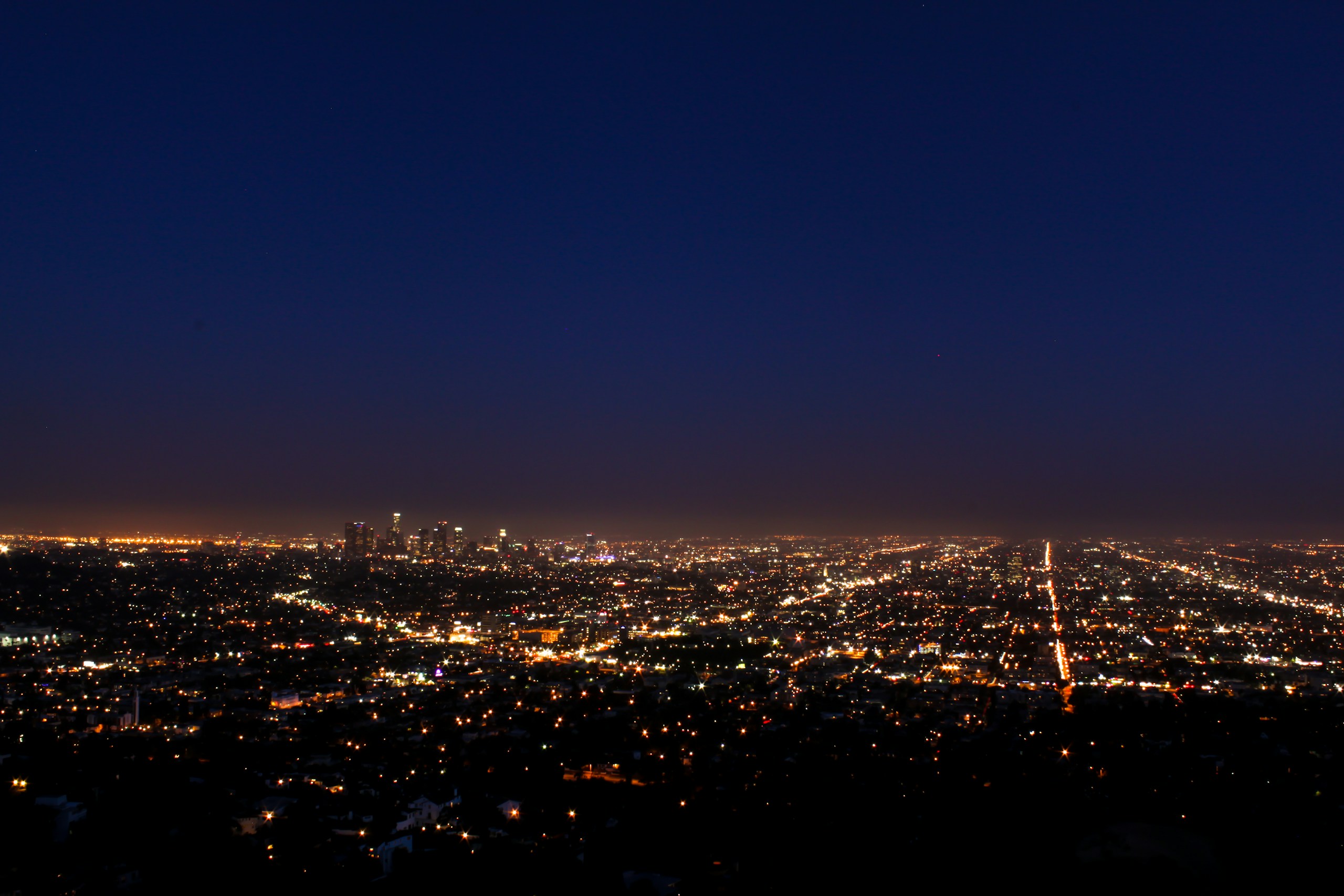 Los Angeles City Skyline and Sprawling Streets at Night HD Wallpaper