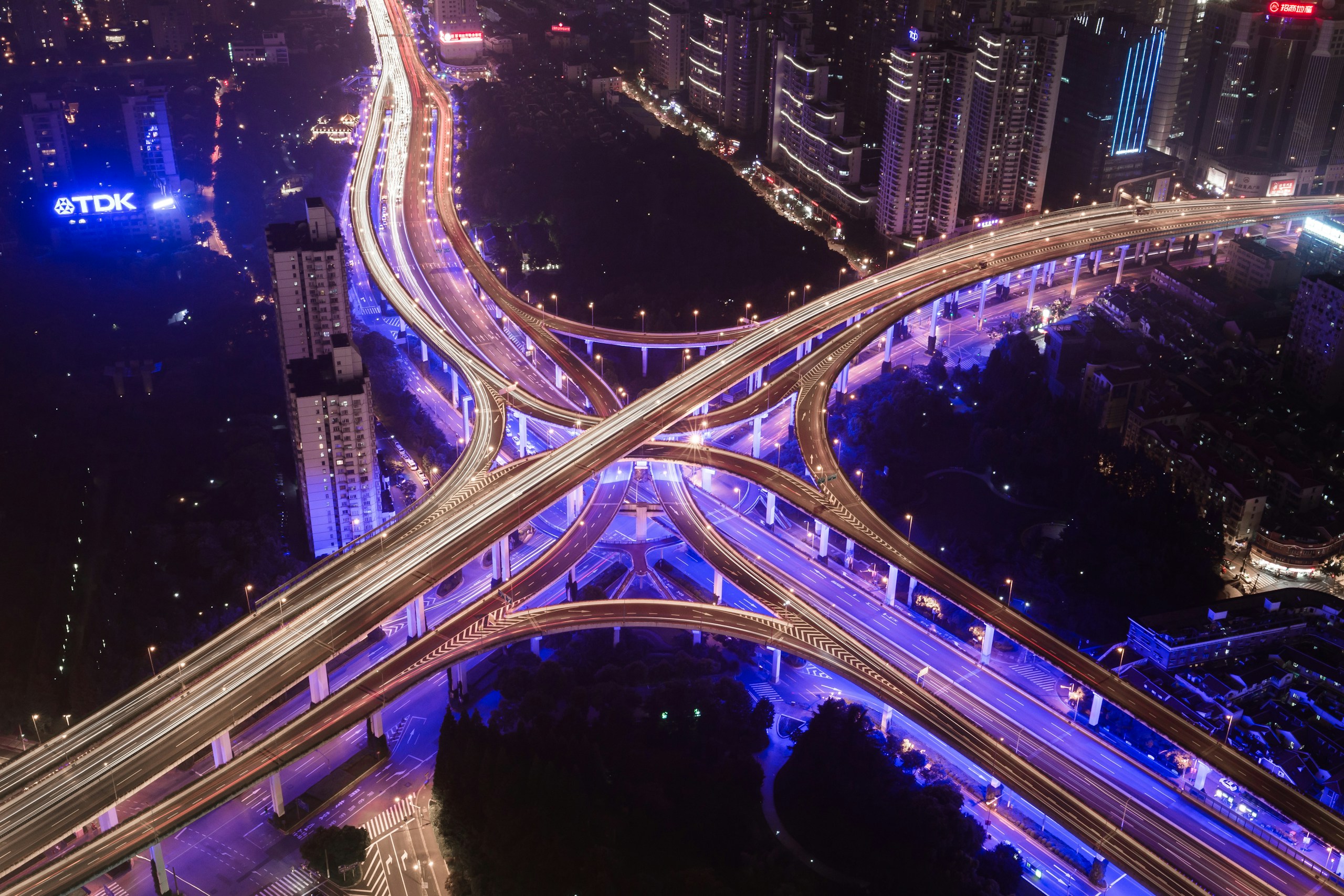 Aerial View of City Highway Interchange at Night HD Wallpaper