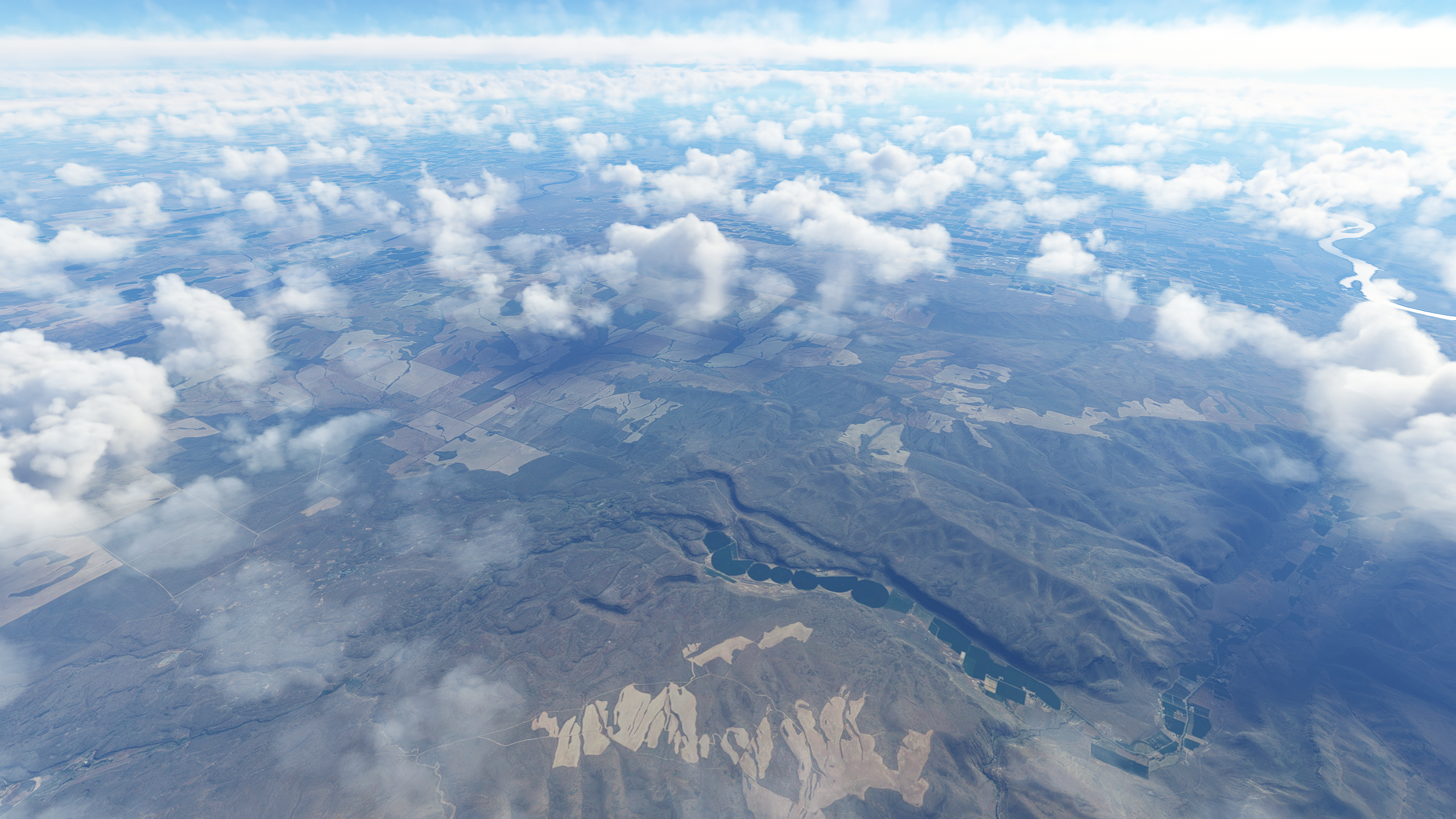 High Altitude Aerial View of Earth and Clouds HD Wallpaper