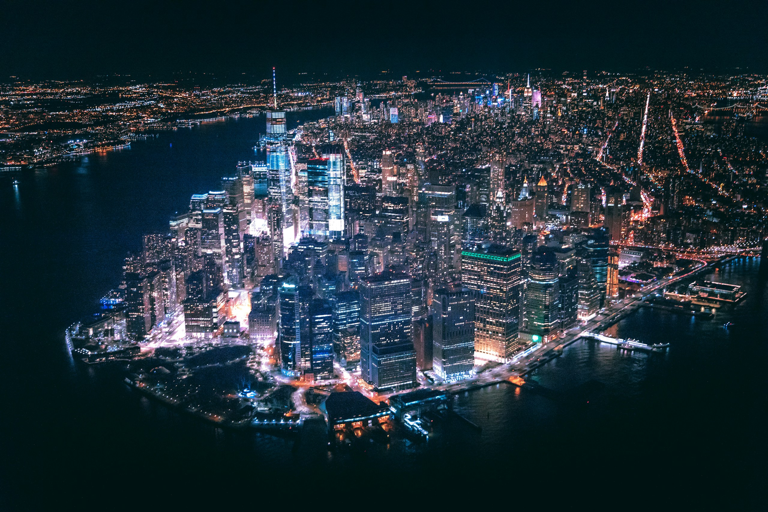 Aerial view of Lower Manhattan skyline at night HD Wallpaper