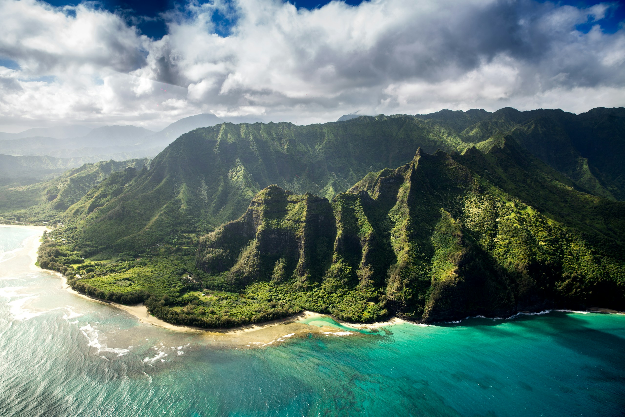 Aerial View of Lush Green Mountains in Kauai Hawaii HD Wallpaper