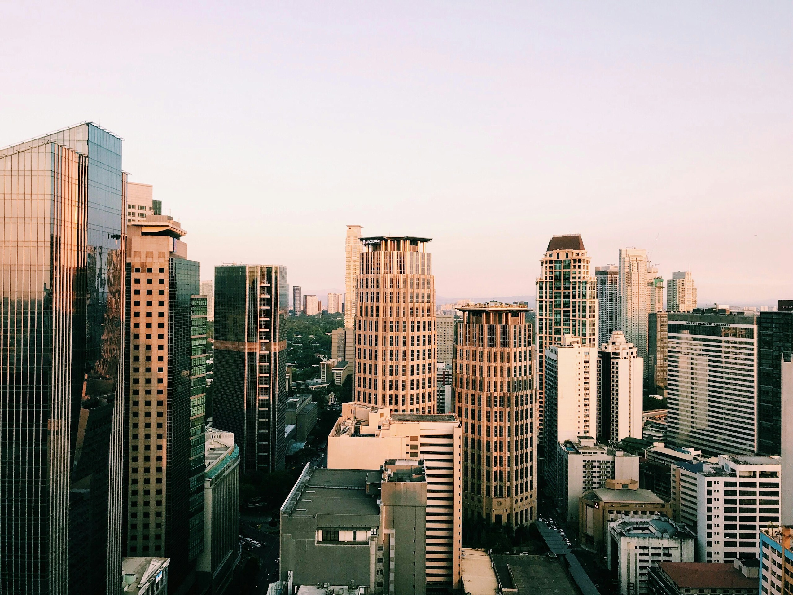 Skyscrapers and high-rise buildings in a city skyline HD Wallpaper