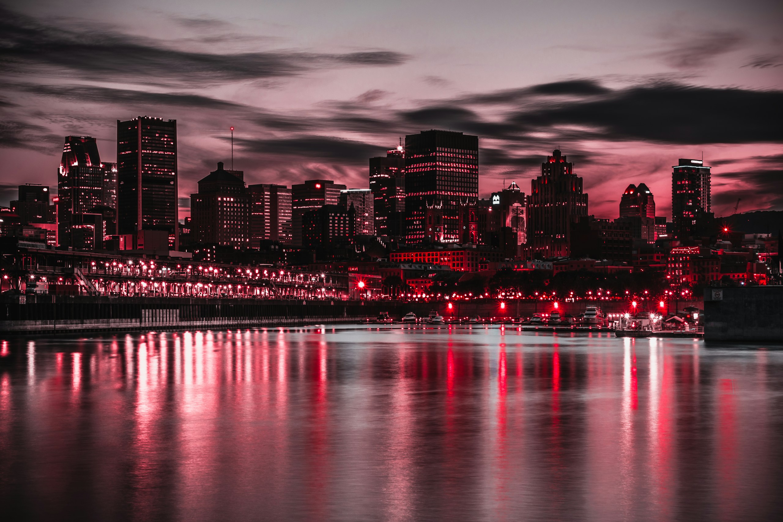 Montreal City Skyline with Red Lights and Water Reflection HD Wallpaper