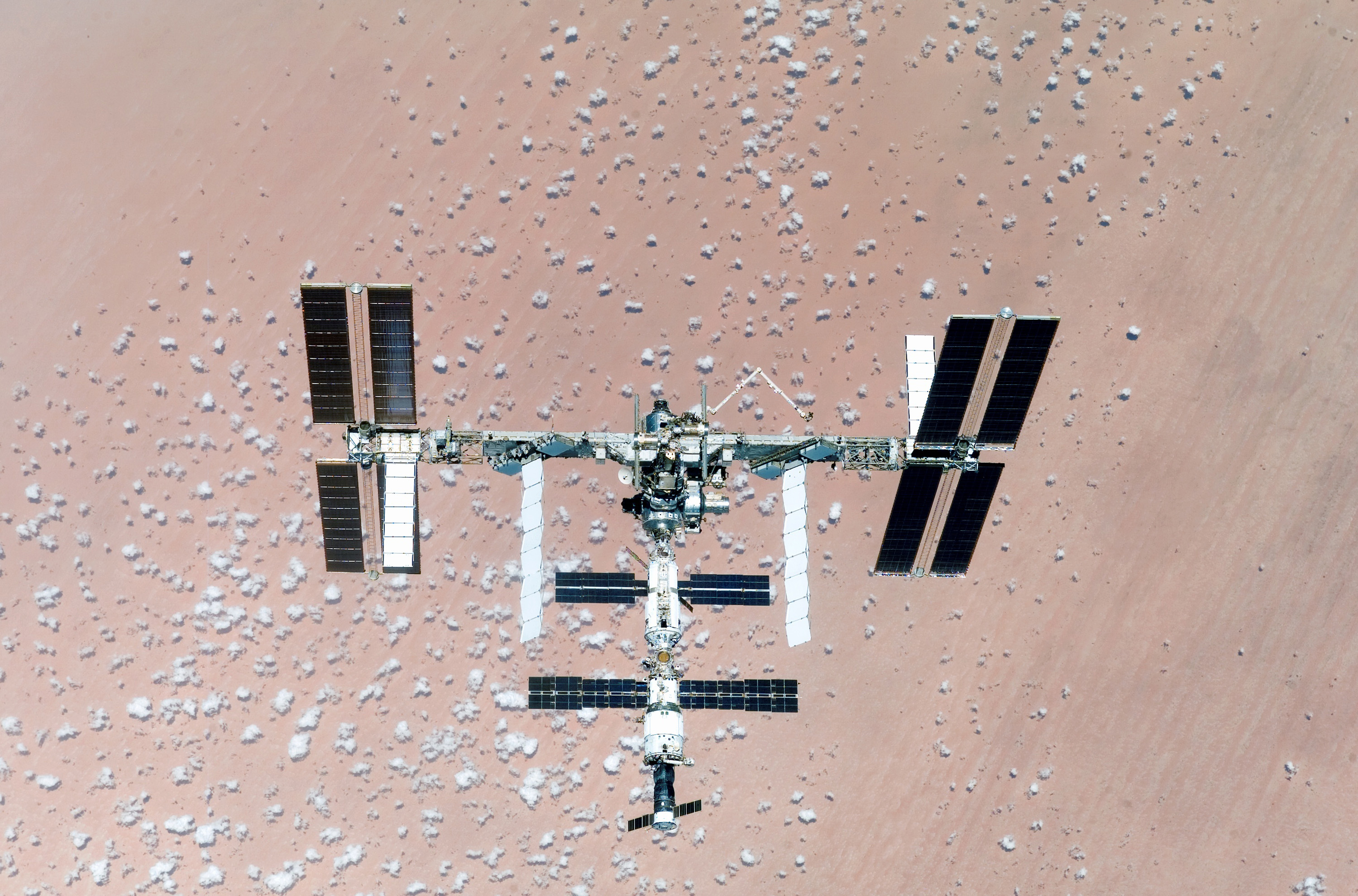 The International Space Station Over Earth HD Wallpaper