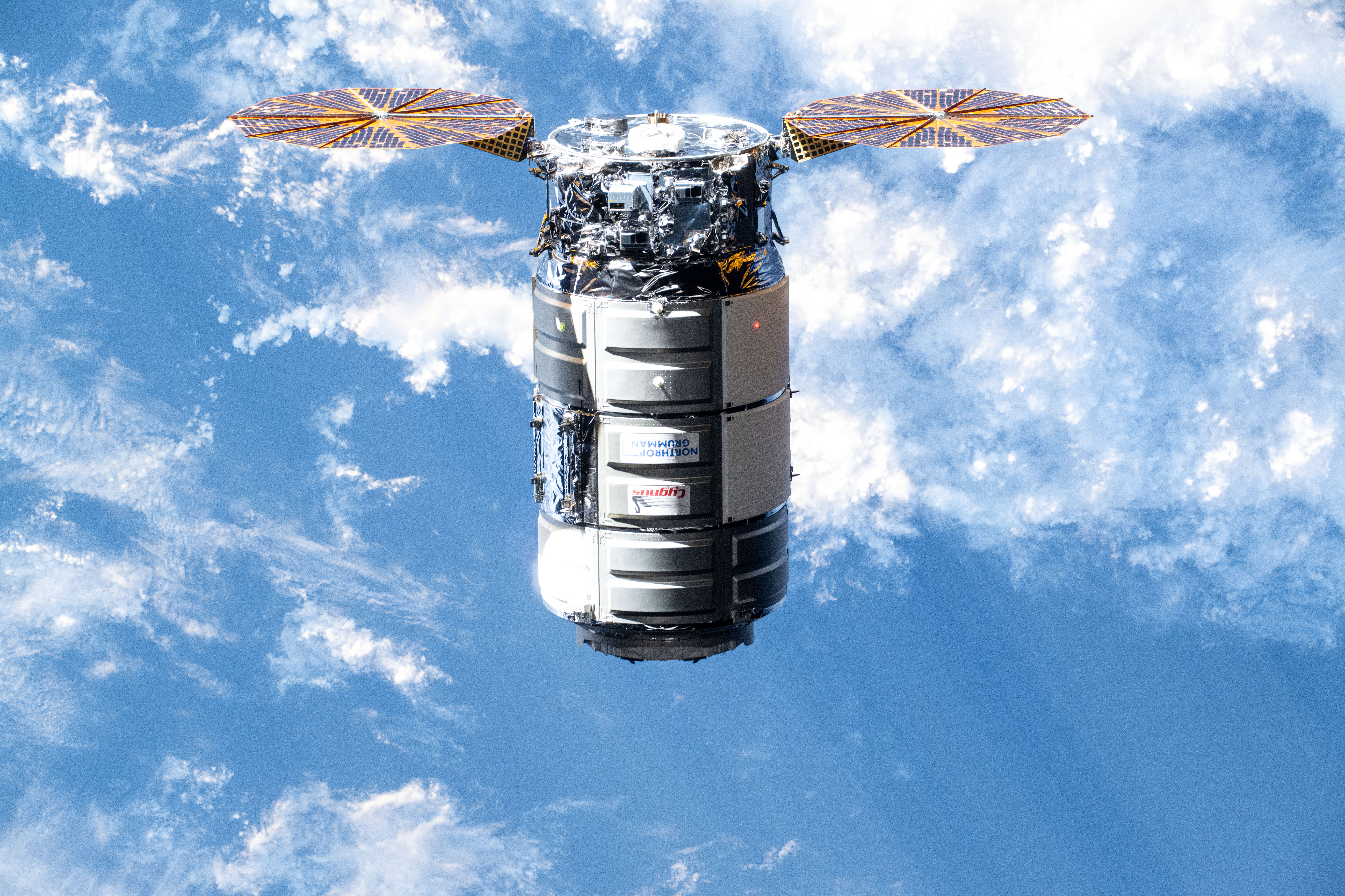 Northrop Grumman Cygnus Spacecraft in Orbit Above Earth HD Wallpaper