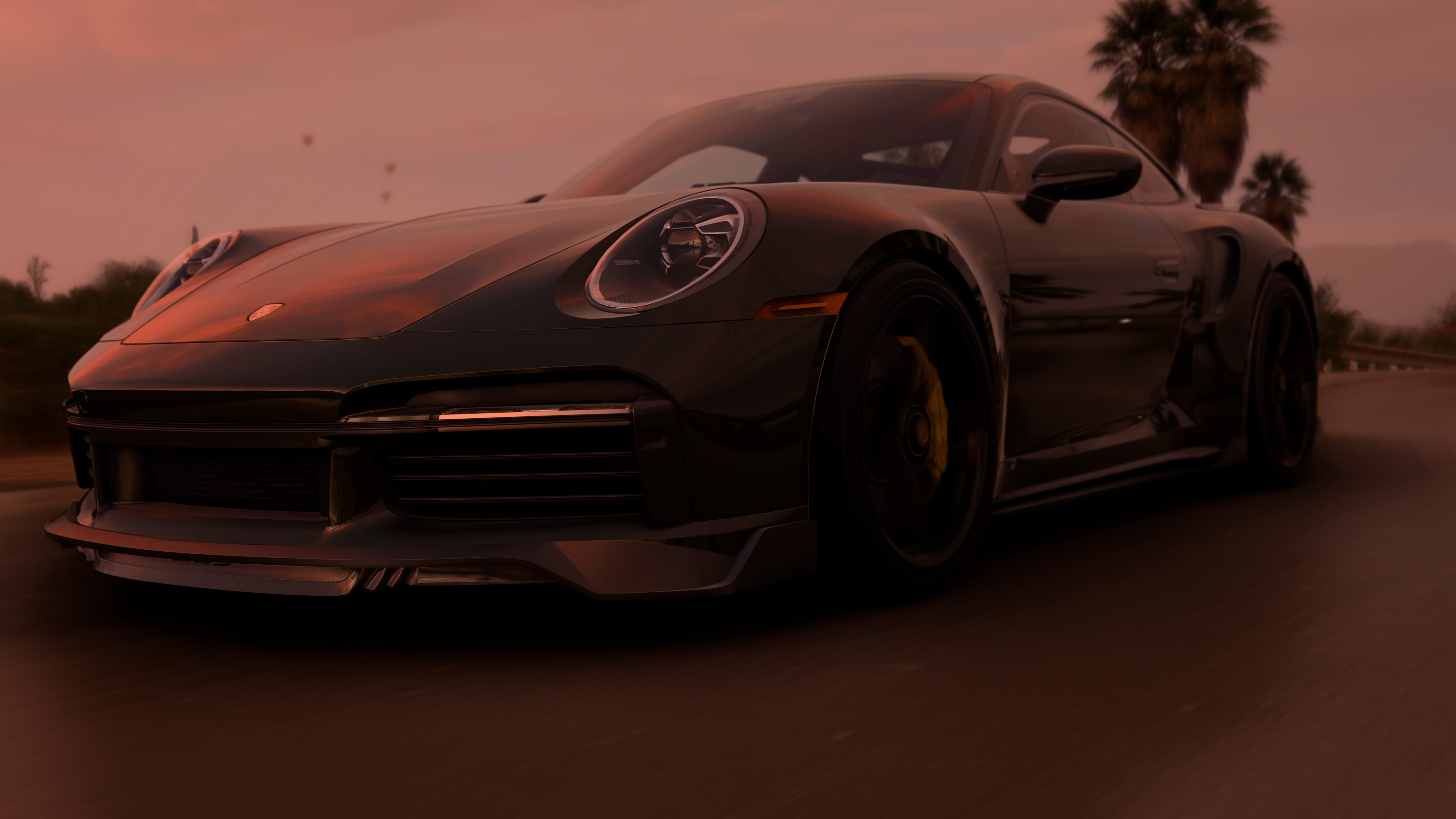 Dark Porsche 911 Turbo S Driving at Sunset HD Wallpaper
