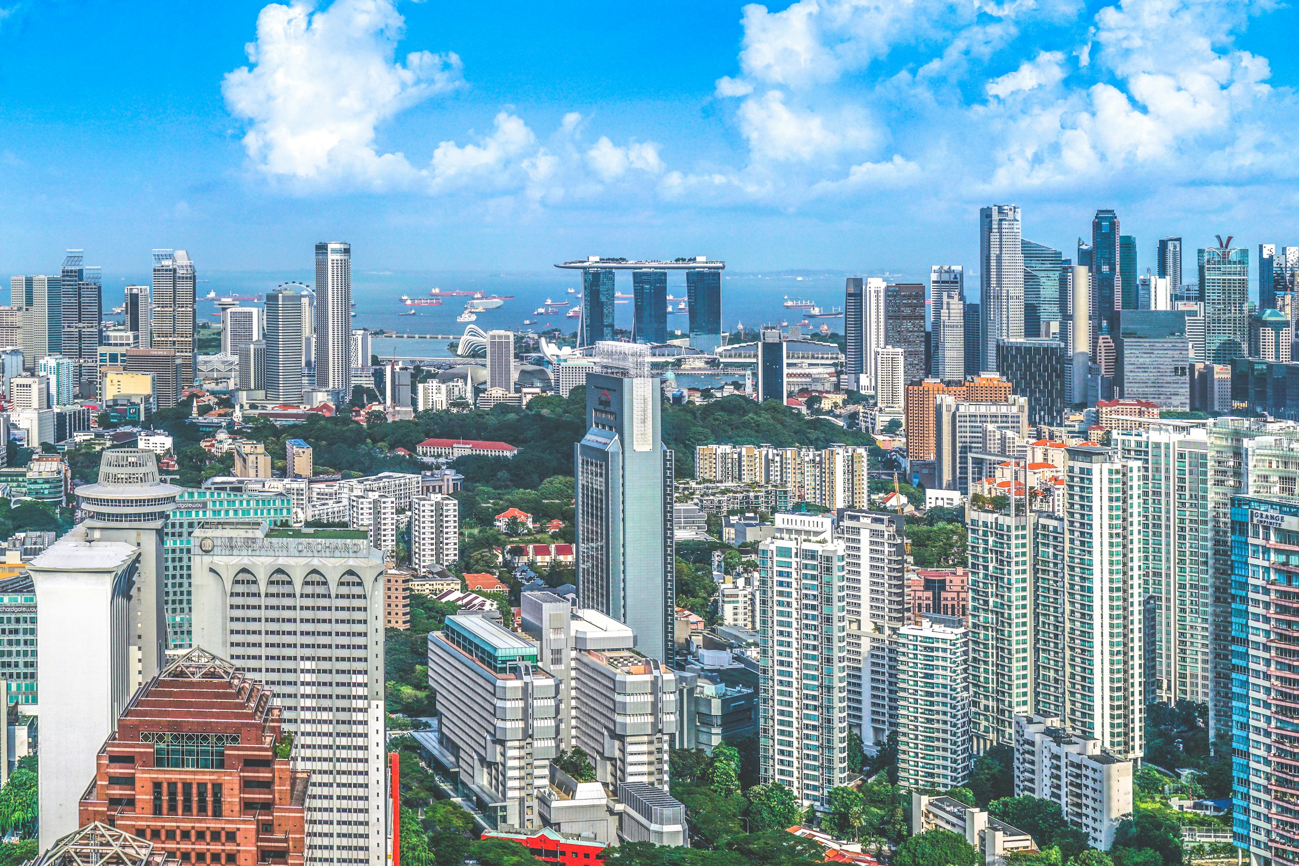 Aerial View of Singapore Skyline with Marina Bay Sands HD Wallpaper