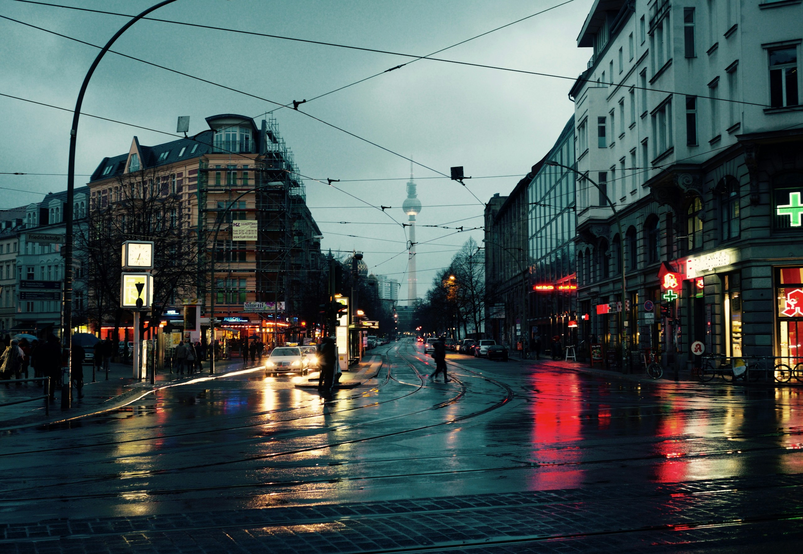Rainy Berlin street with Fernsehturm reflections HD Wallpaper