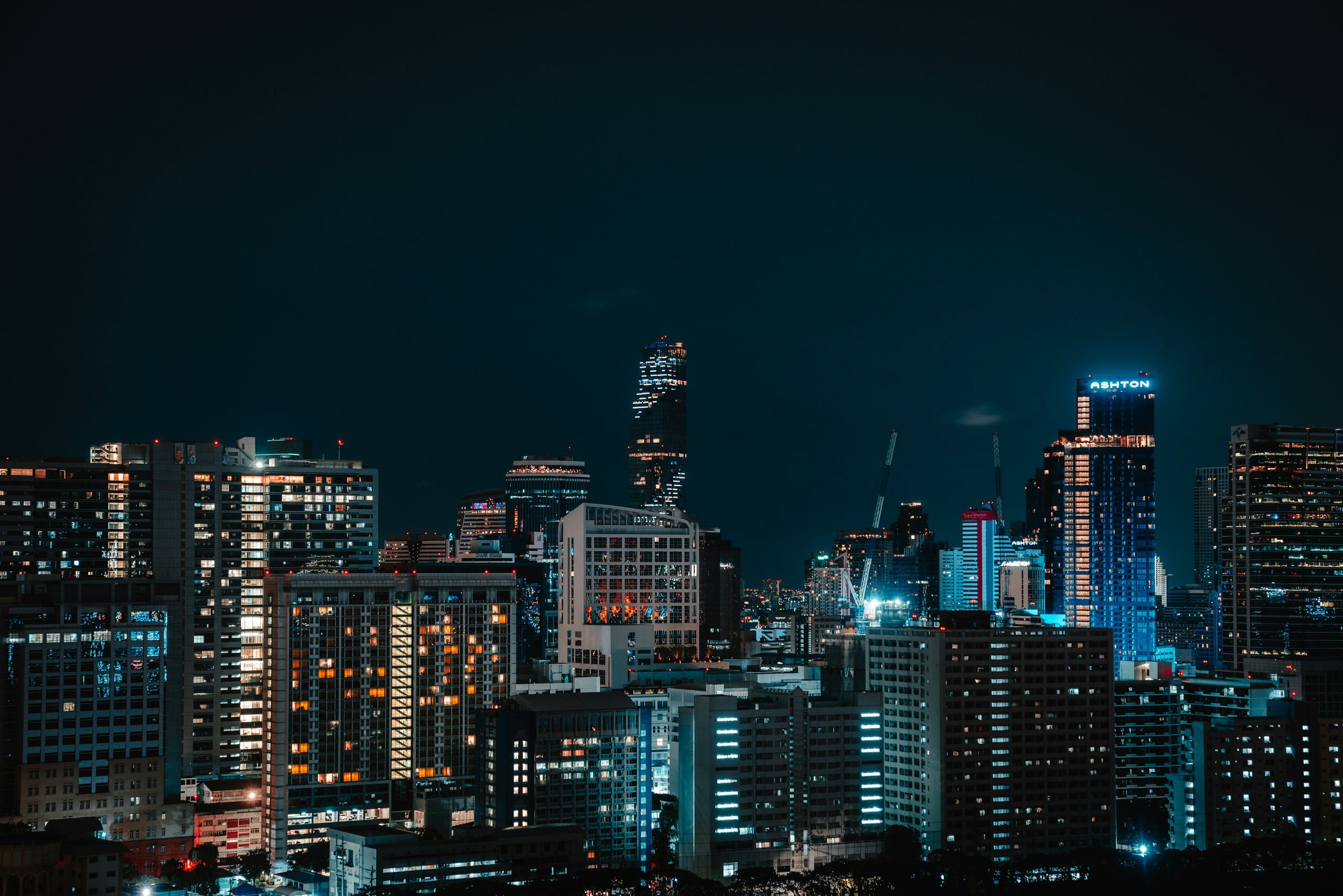 Bangkok City Skyline at Night with Illuminated Skyscrapers HD Wallpaper