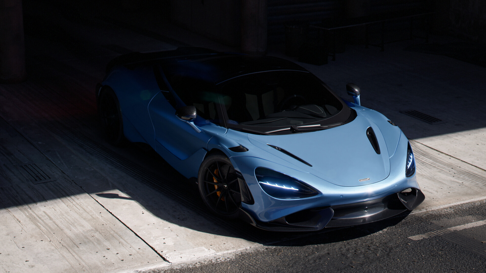 Light blue McLaren 765LT sports car in a dark garage HD Wallpaper