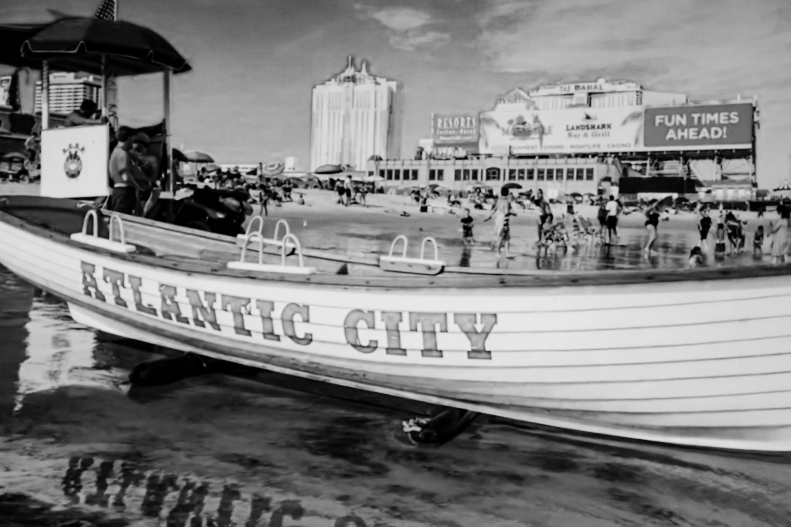 Vintage Style Atlantic City Lifeguard Boat on Beach HD Wallpaper