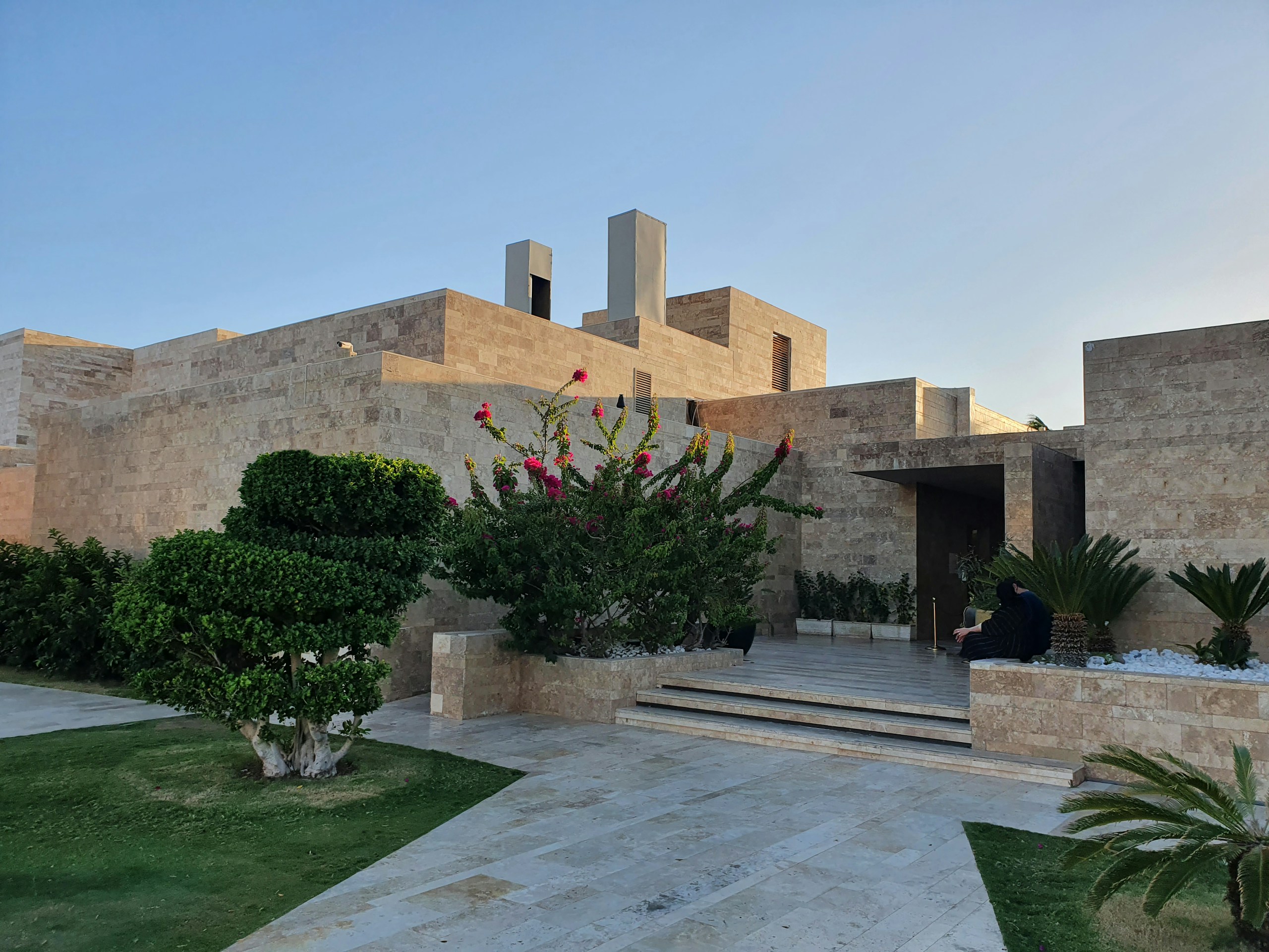 Modern Stone Architecture with Landscaped Garden HD Wallpaper