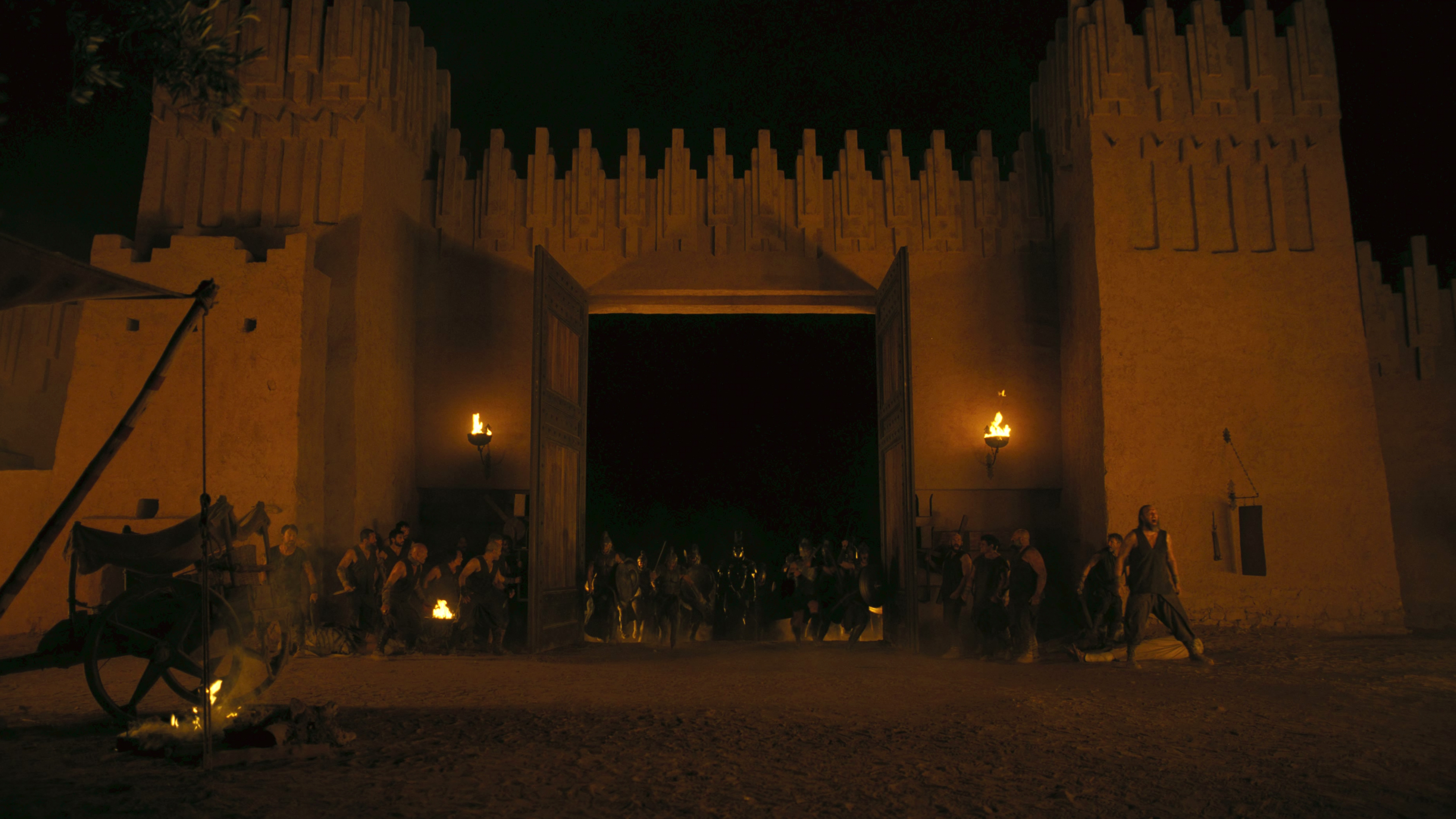 Ancient city gates at night in The Odyssey HD Wallpaper