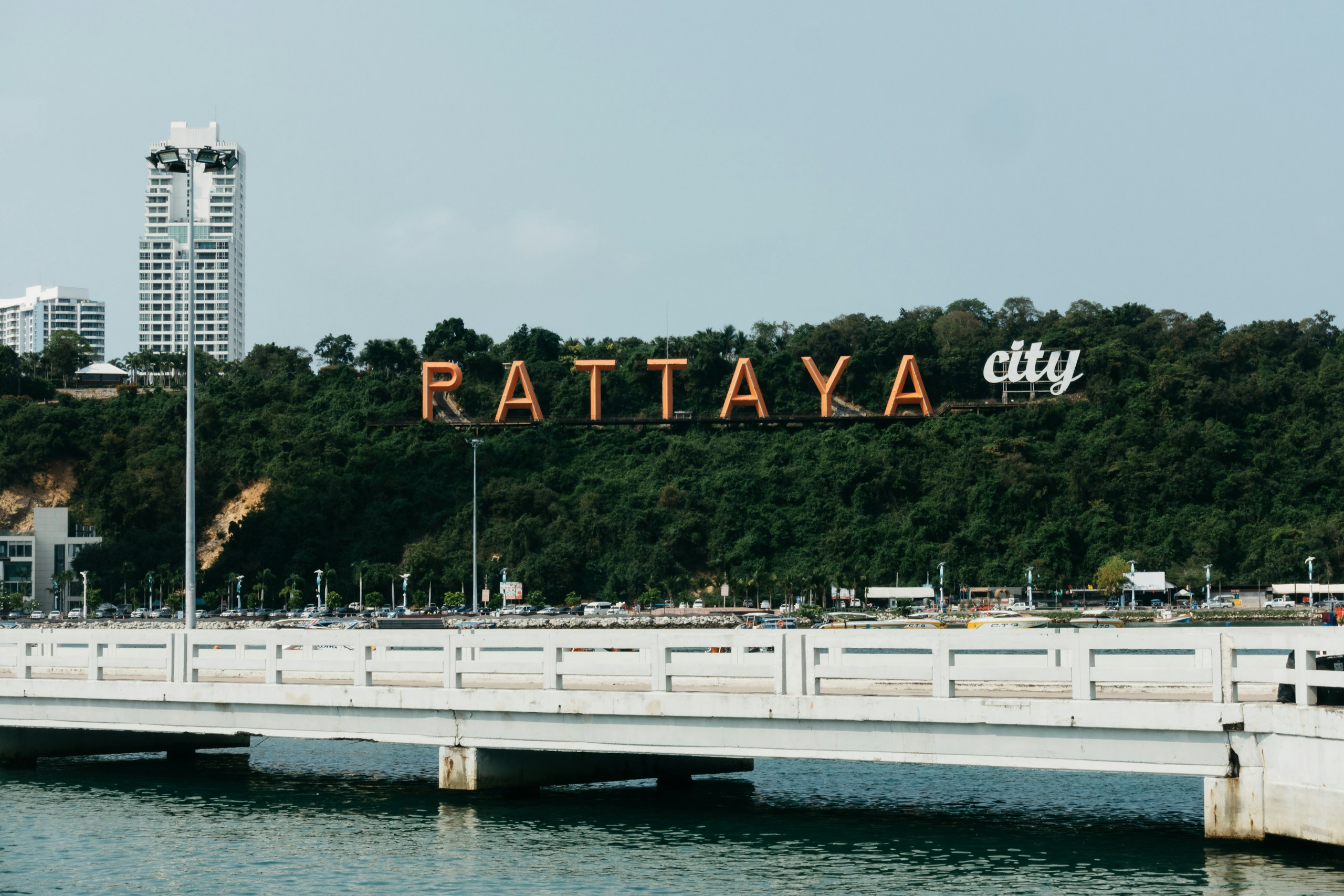Pattaya City Sign on Hillside Behind Pier HD Wallpaper