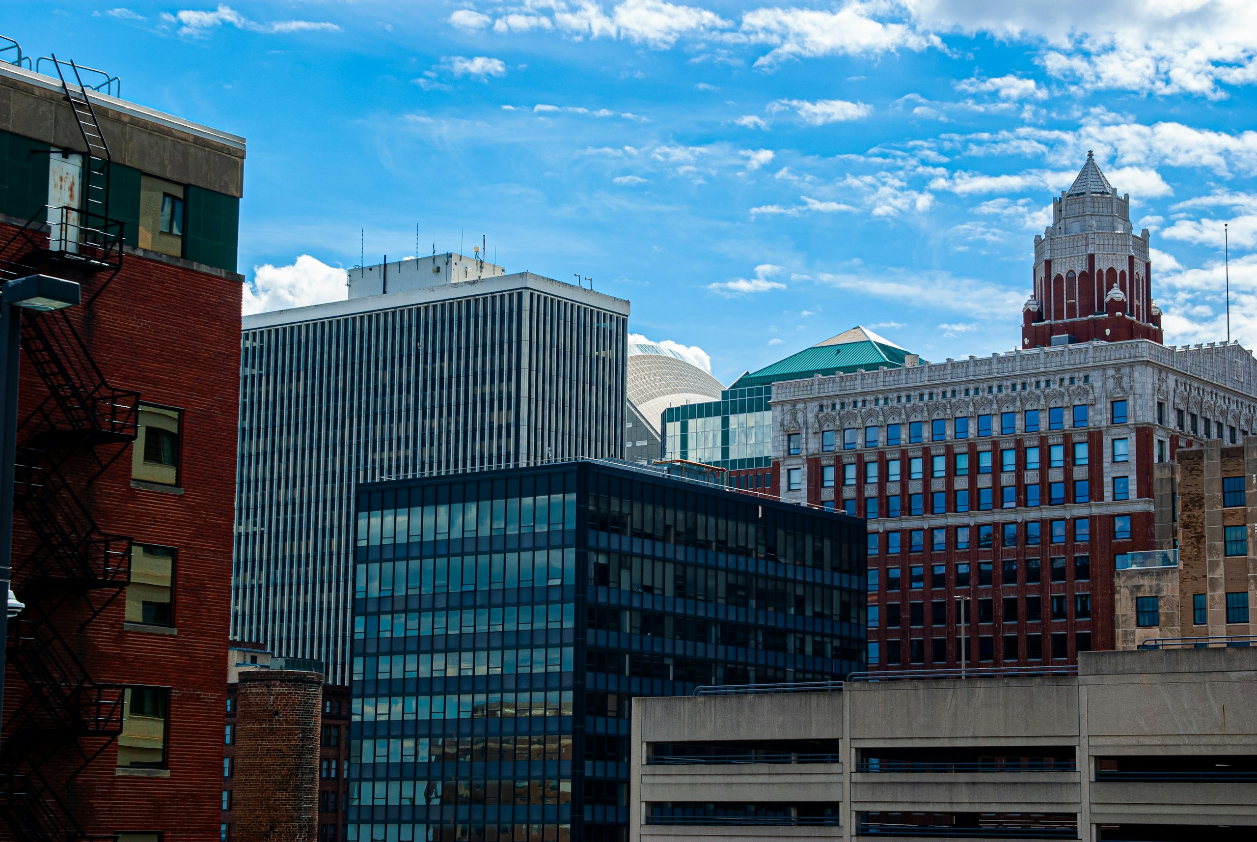 Diverse City Buildings and Skyscrapers Under Blue Sky HD Wallpaper