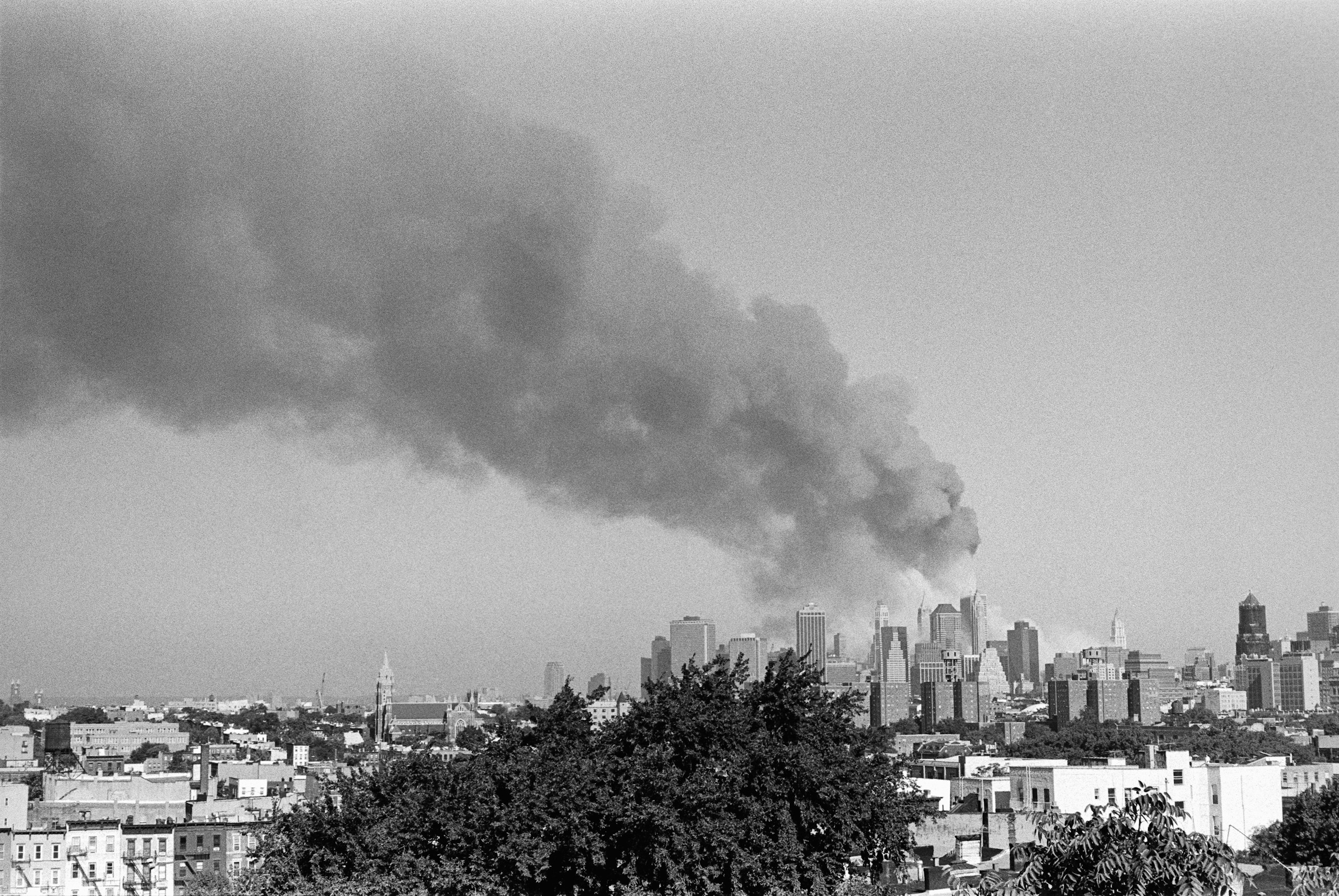 Manhattan Skyline with Smoke Plume on September 11 HD Wallpaper
