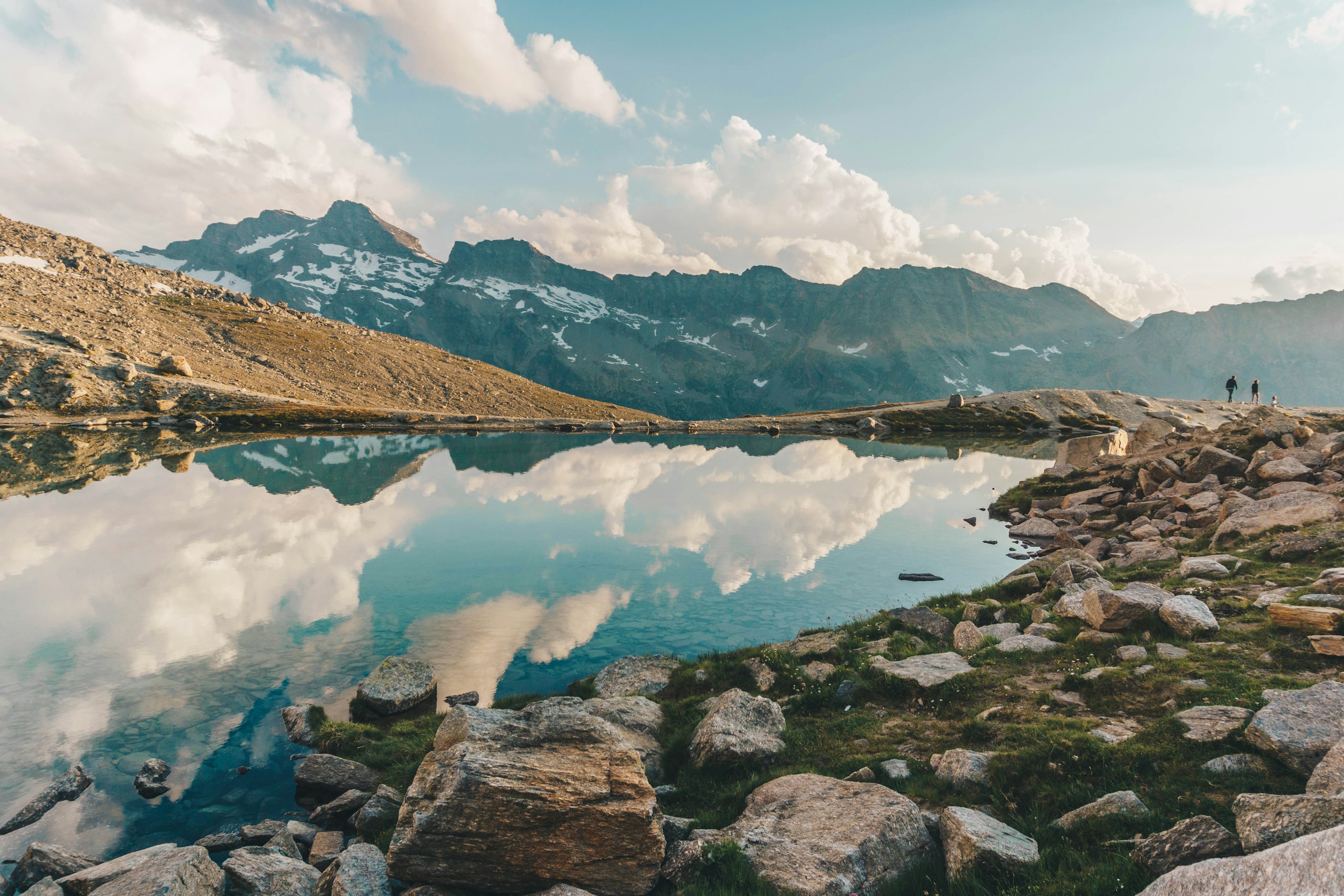 Alpine Lake Reflecting Mountains and Sky in Italy HD Wallpaper