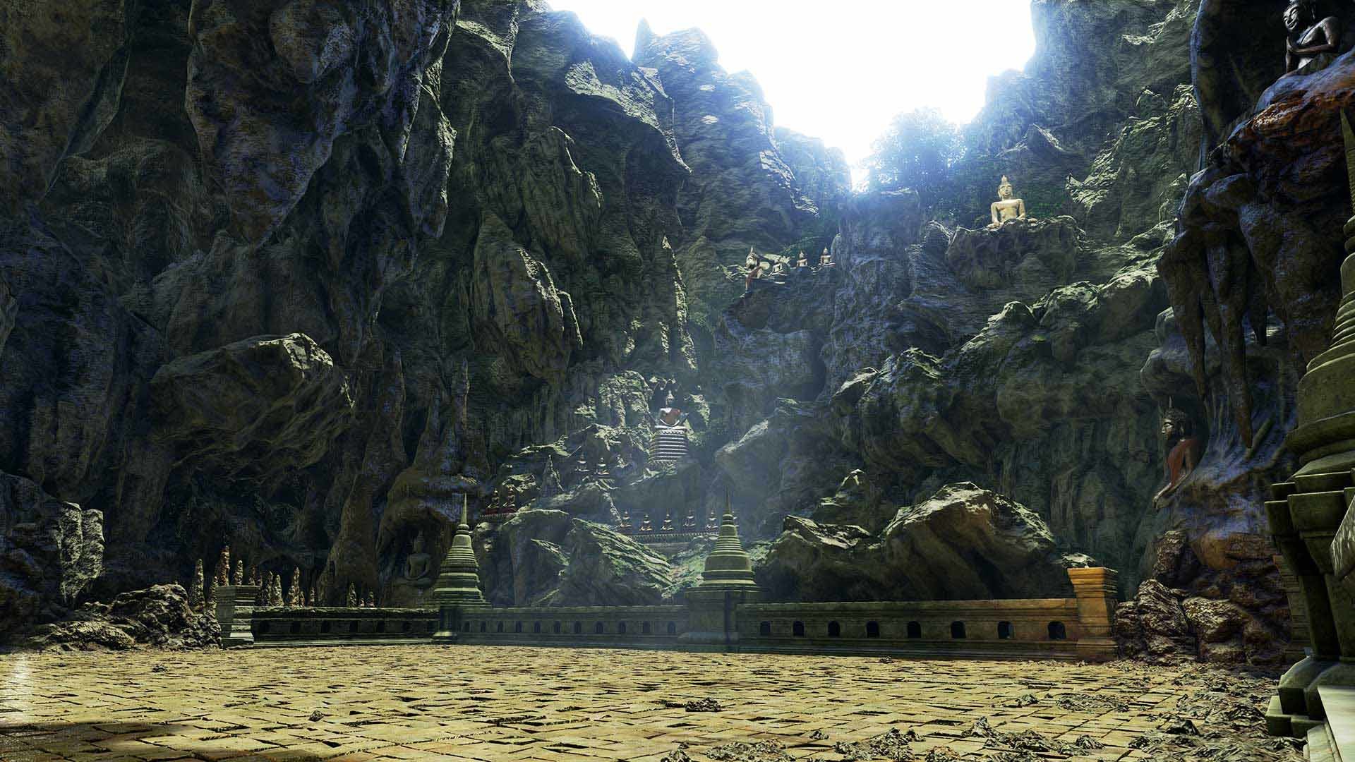 Buddhist Temple Statues in a Rocky Cavern HD Wallpaper