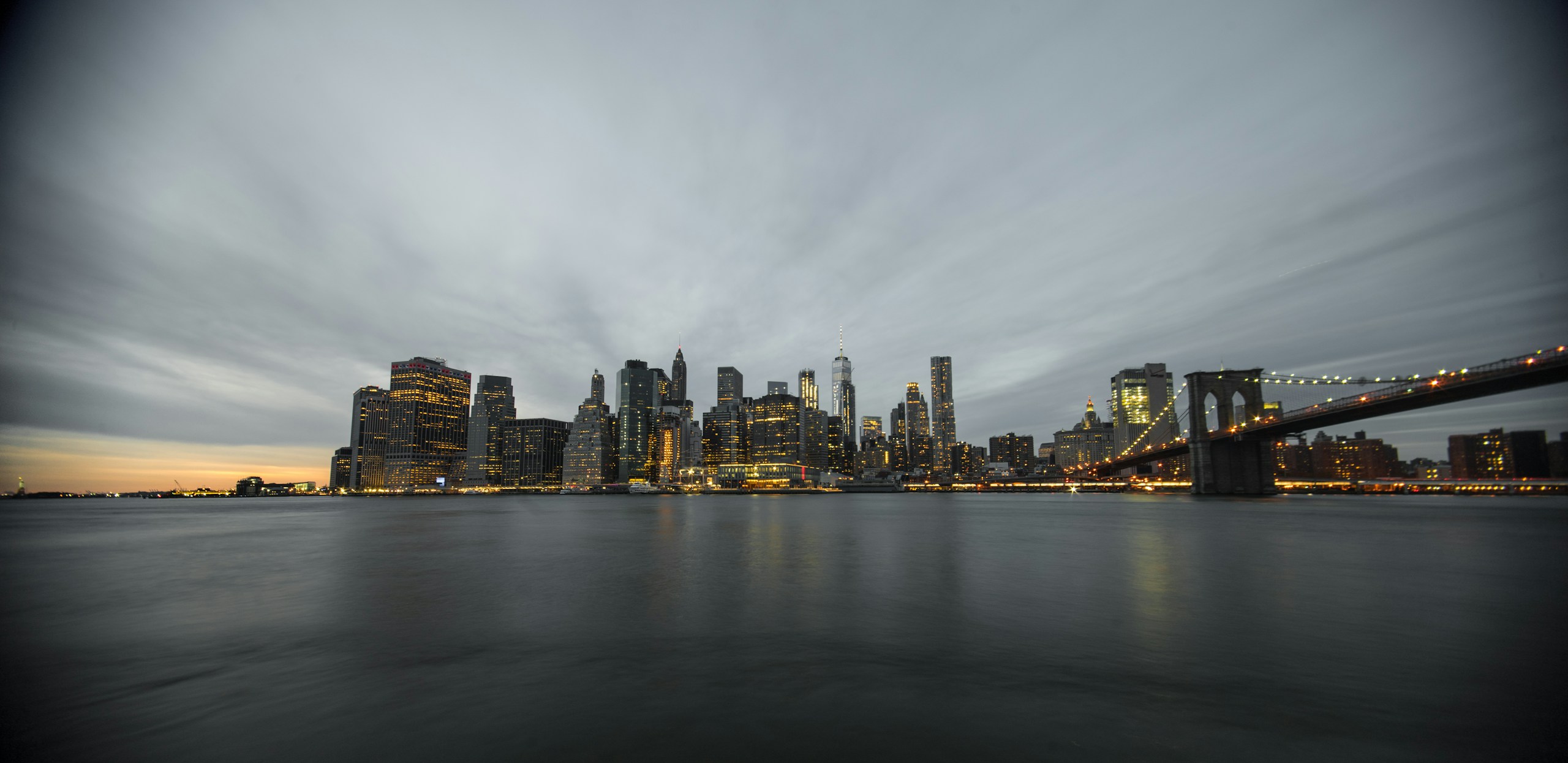 Manhattan Skyline and Brooklyn Bridge at Dusk HD Wallpaper