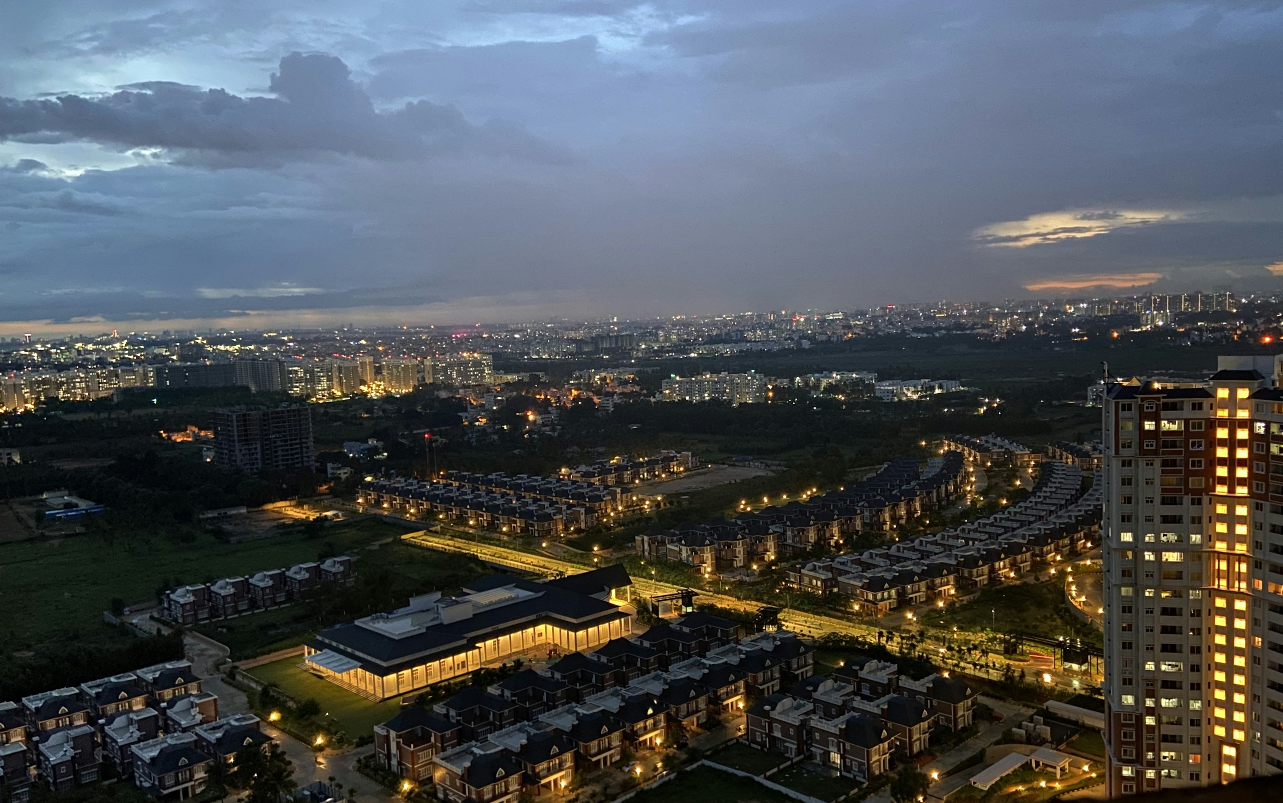 Aerial View of Prestige Lakeside Habitat Villas at Dusk HD Wallpaper