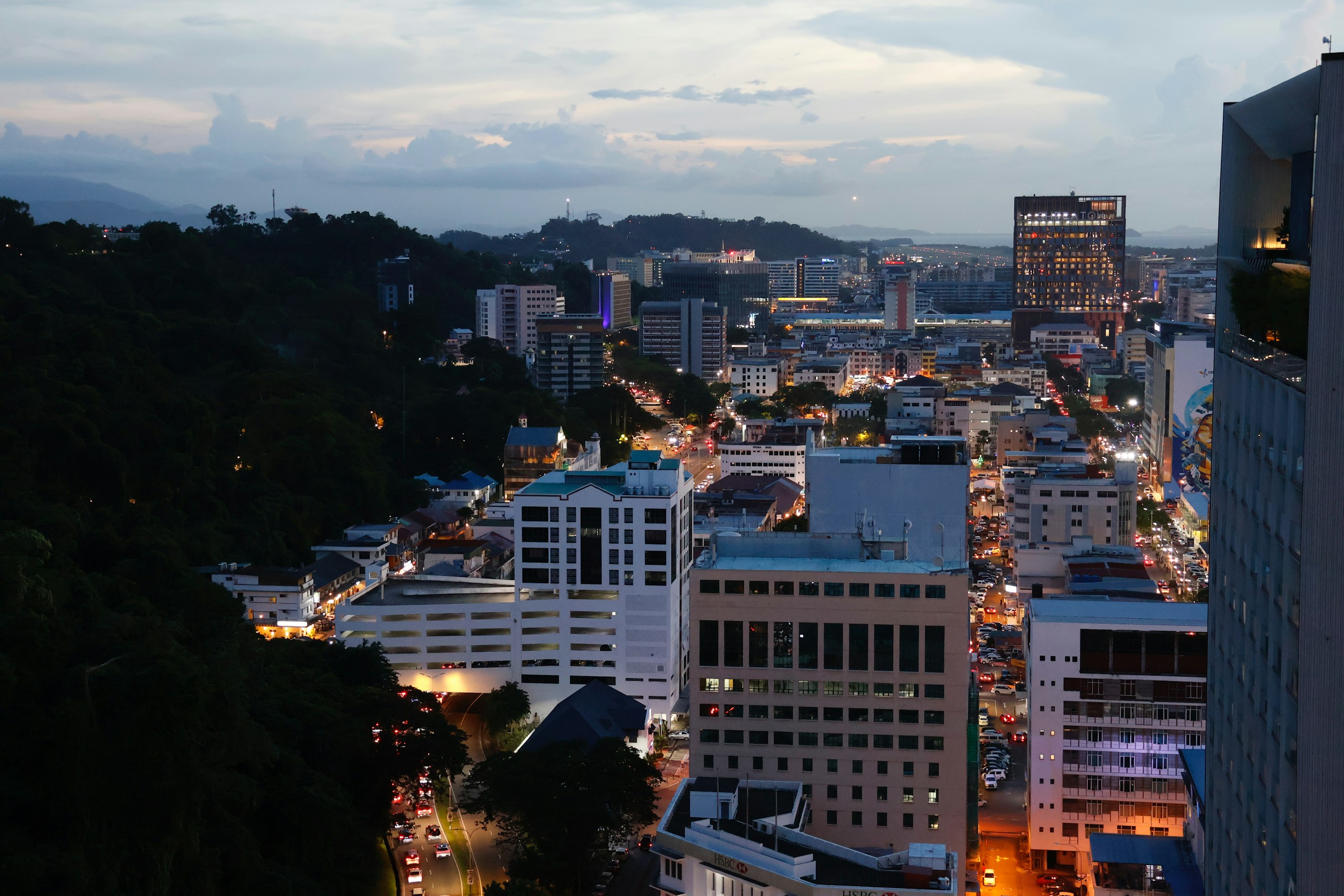 City Skyline with Illuminated Buildings at Dusk HD Wallpaper