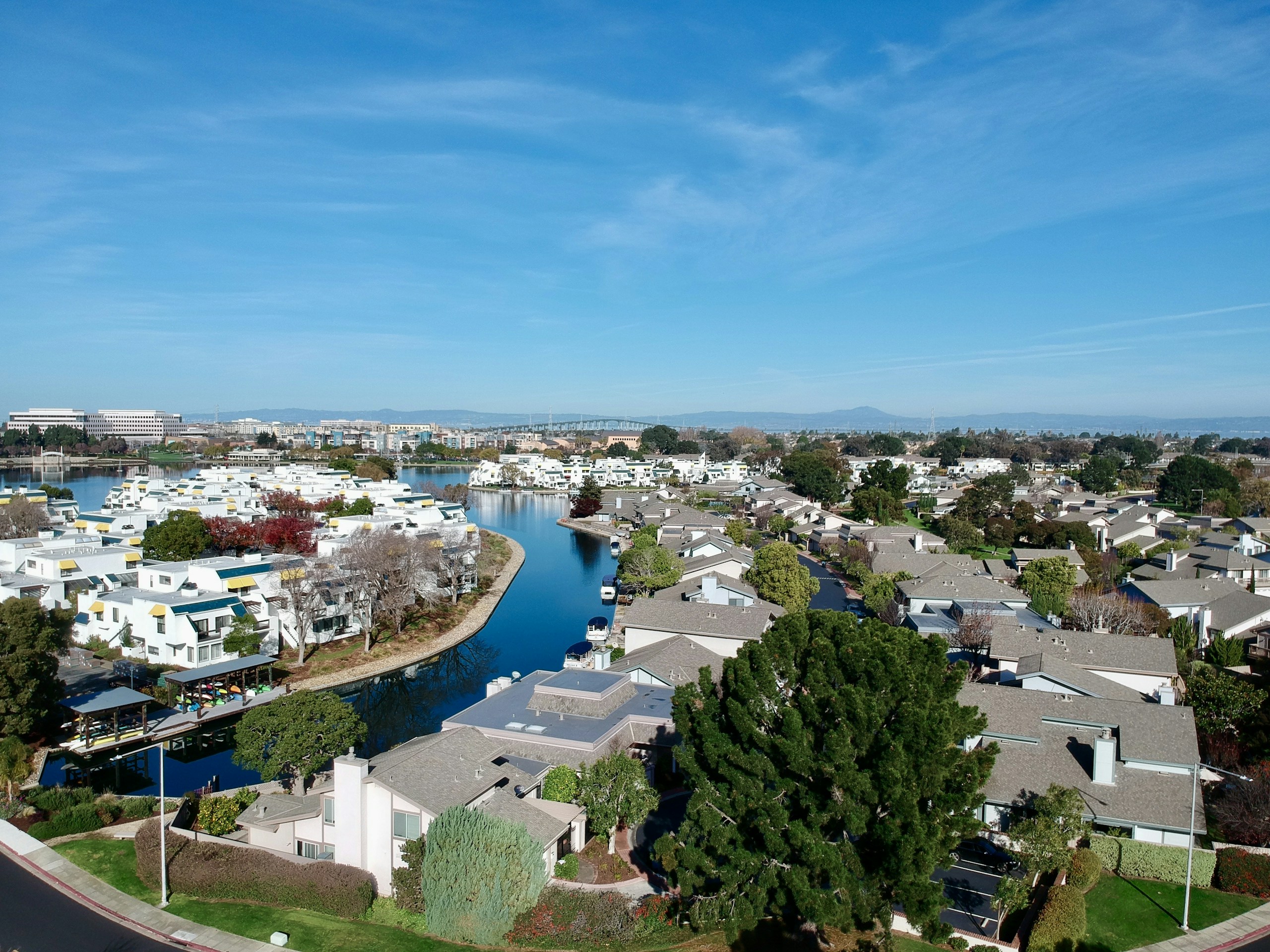 Aerial view of waterfront townhouses and canals HD Wallpaper
