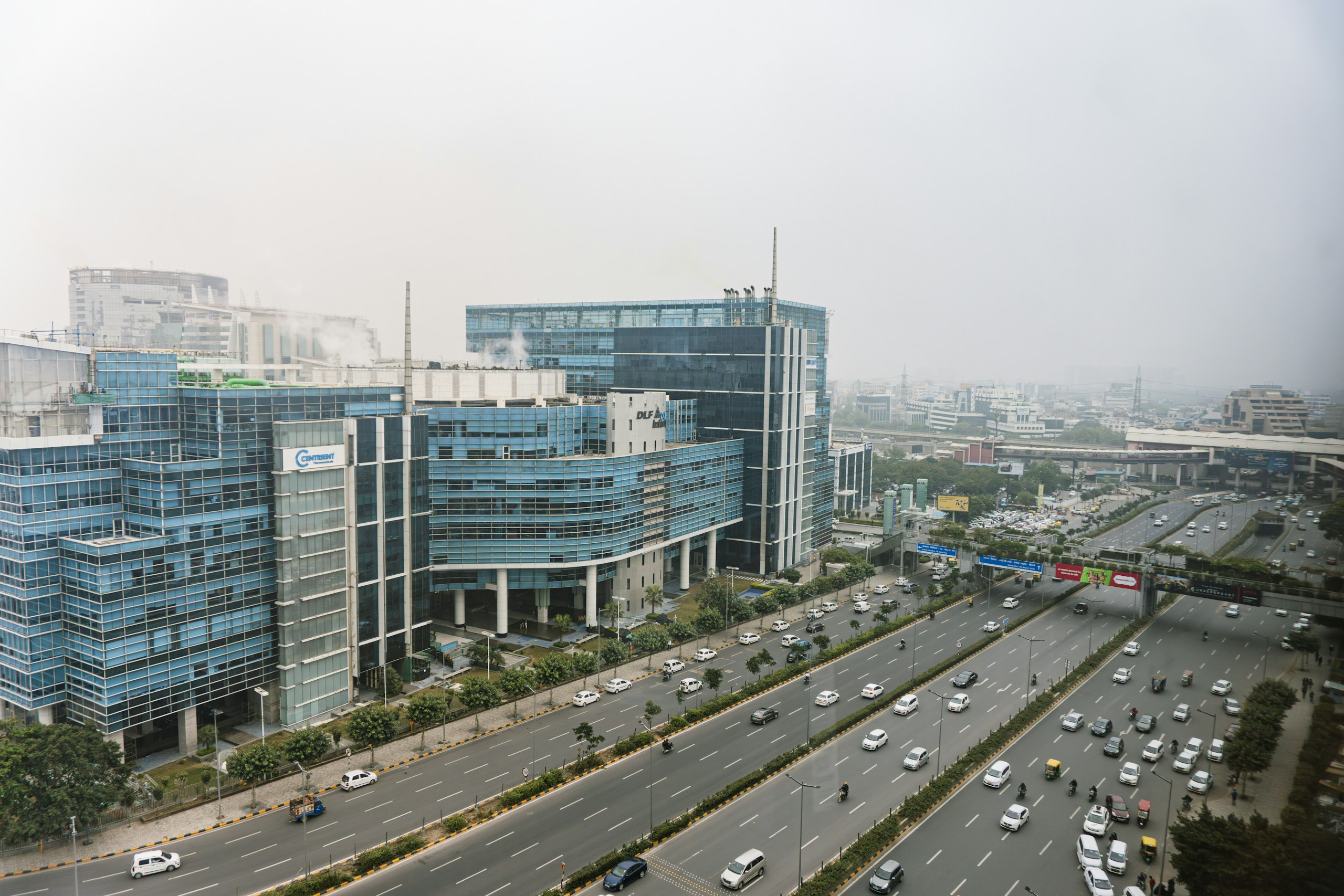 Gurgaon City Skyline and Highway Traffic HD Wallpaper