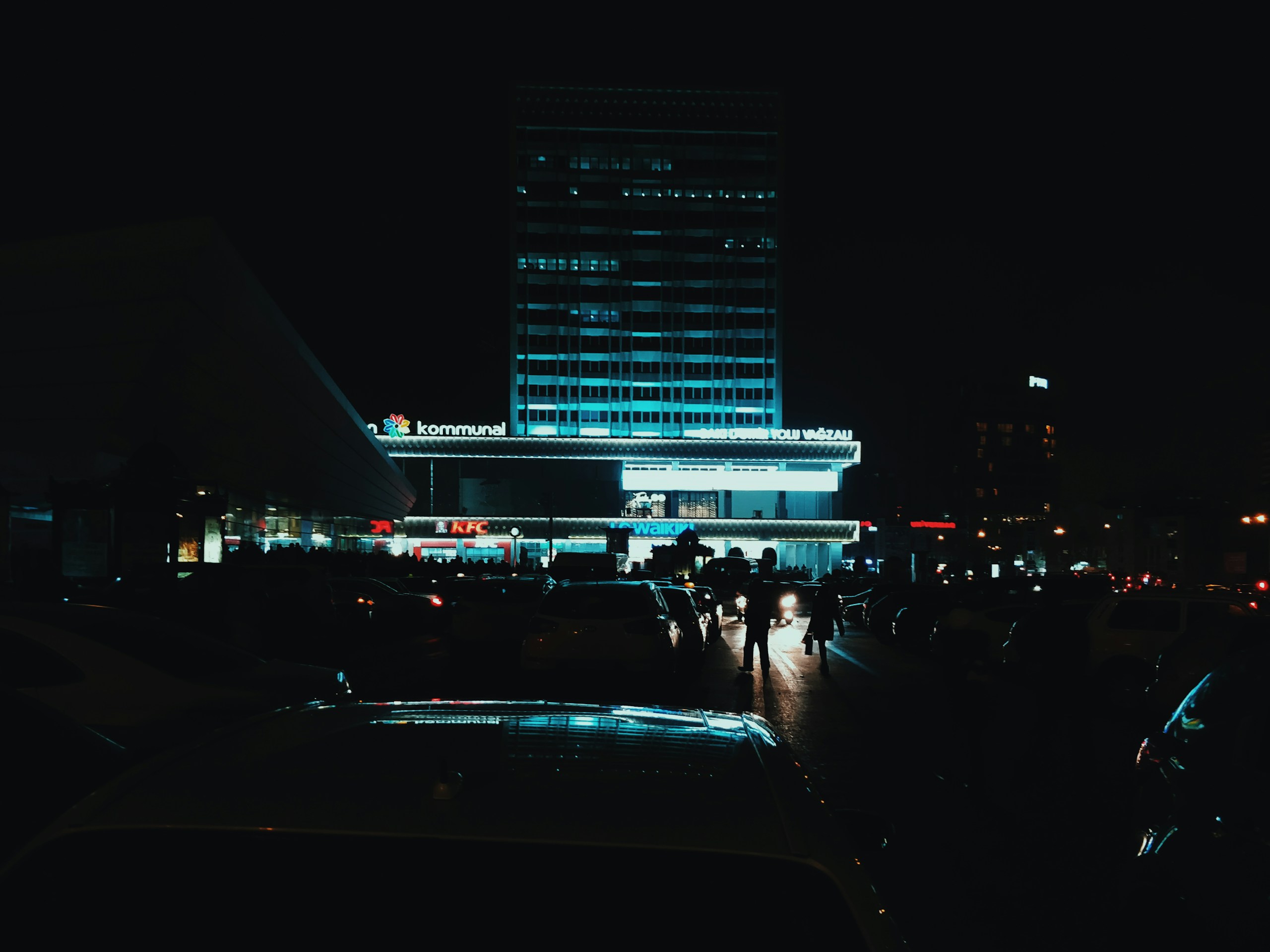 Illuminated city building and street at night HD Wallpaper