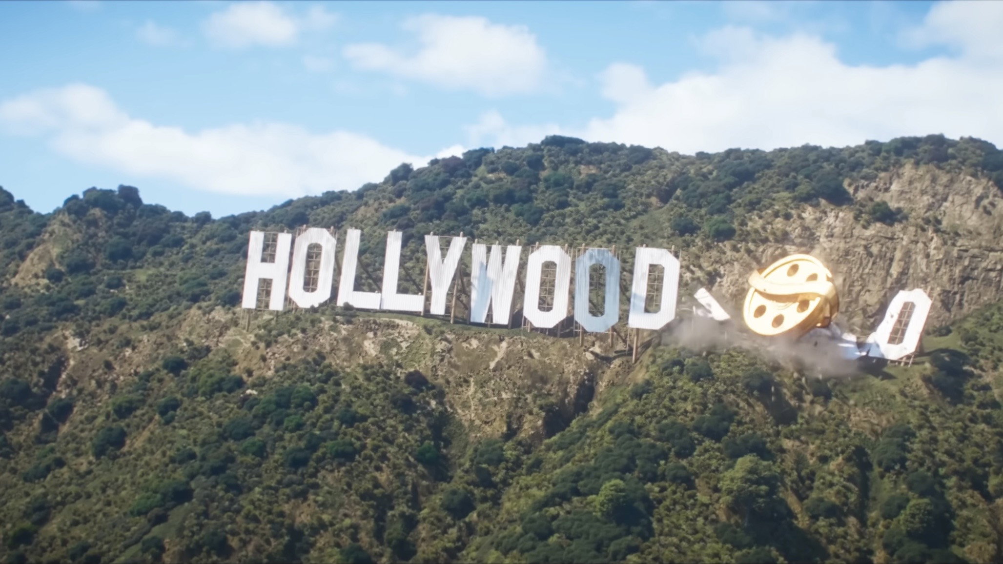 Golden Minion film reel crashing through the Hollywood sign HD Wallpaper