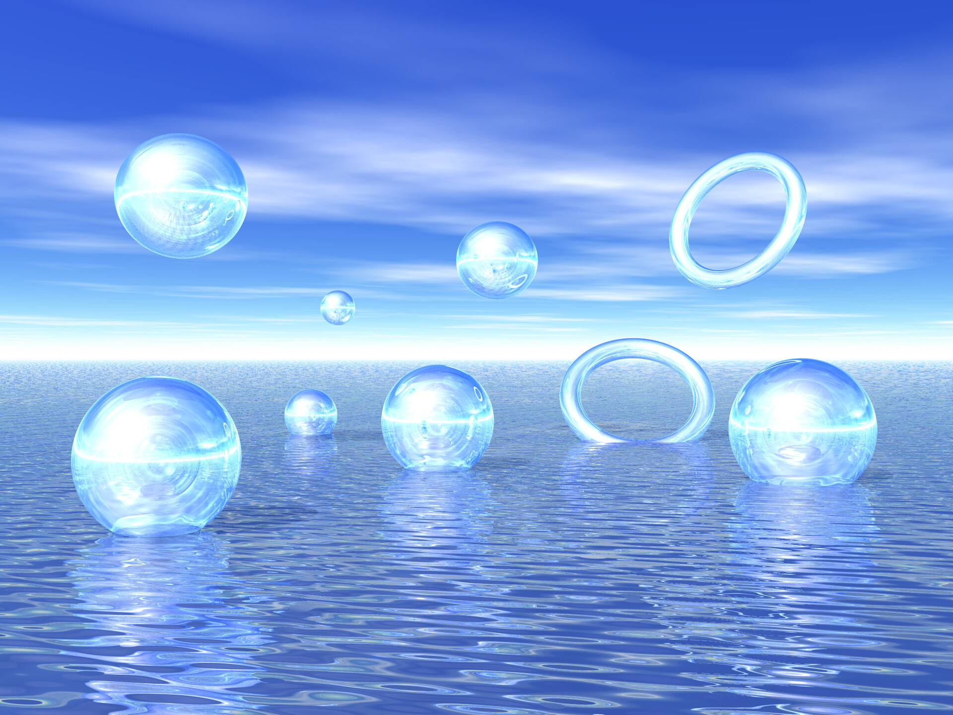 Blue glass spheres and rings on water surface HD Wallpaper