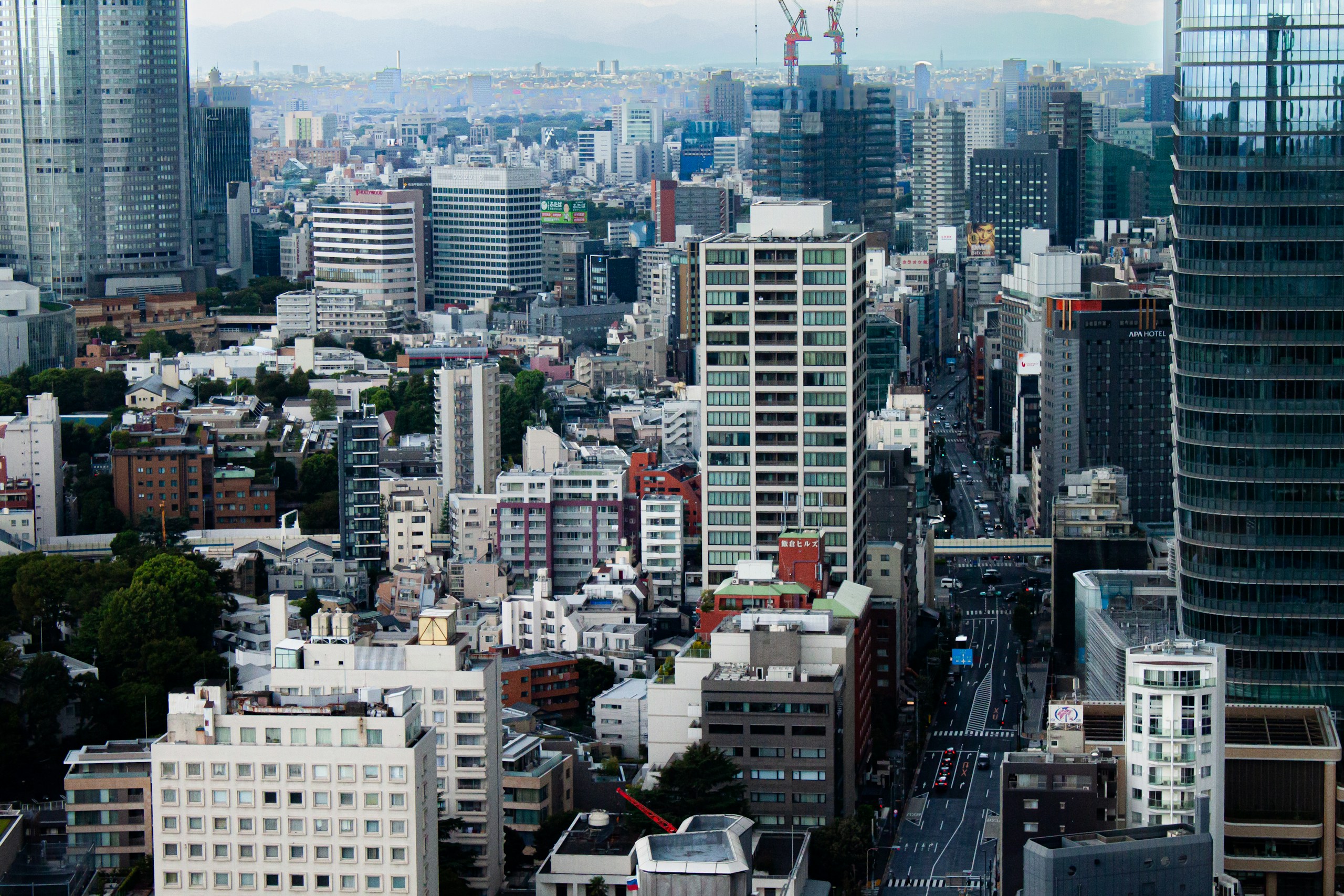 Dense Tokyo Cityscape with Skyscrapers and Streets HD Wallpaper