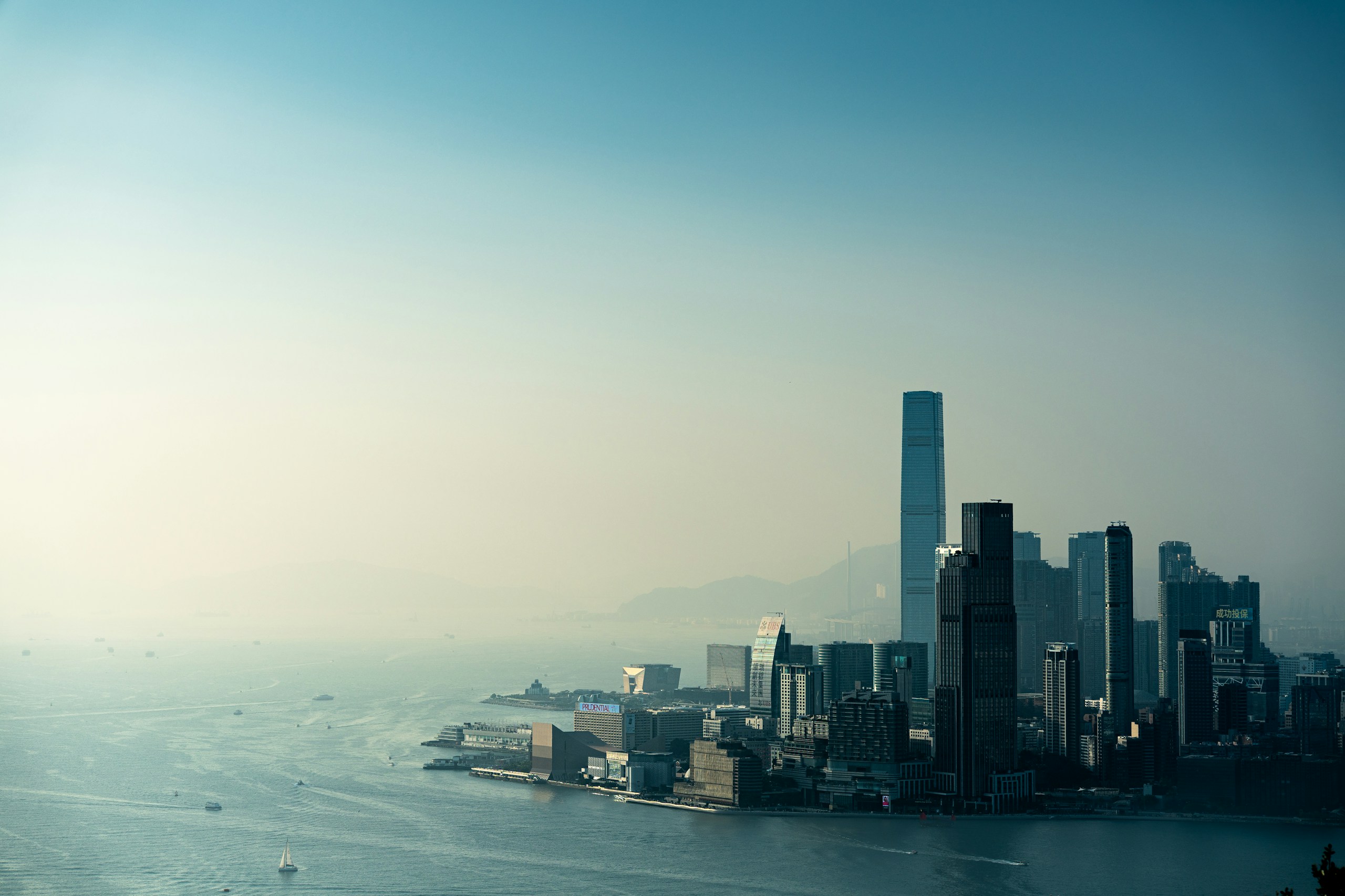 Hazy Skyline of Hong Kong and Victoria Harbour HD Wallpaper