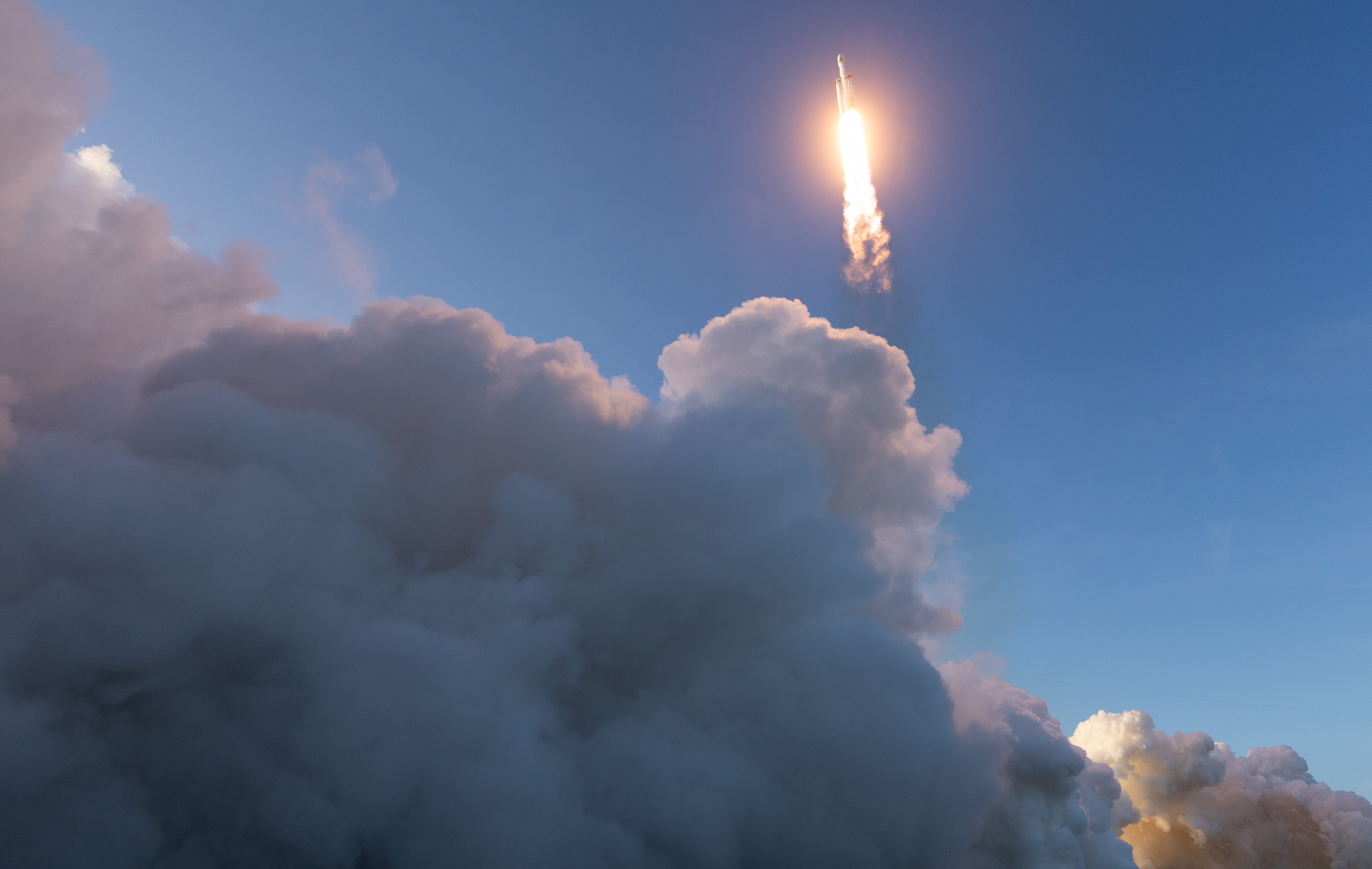 Falcon Heavy Rocket Launching Above the Clouds HD Wallpaper