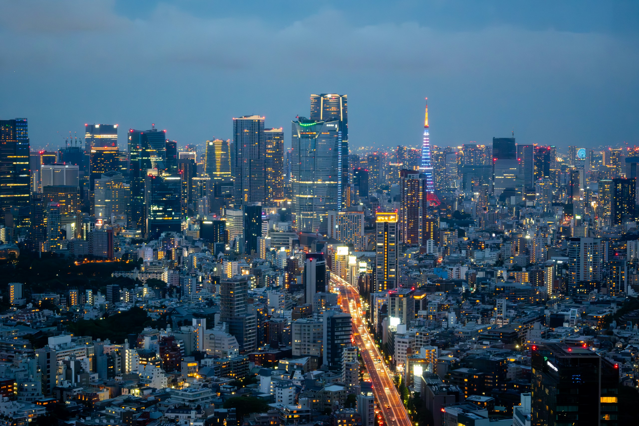 Tokyo Tower and Illuminated Skyscrapers at Night HD Wallpaper