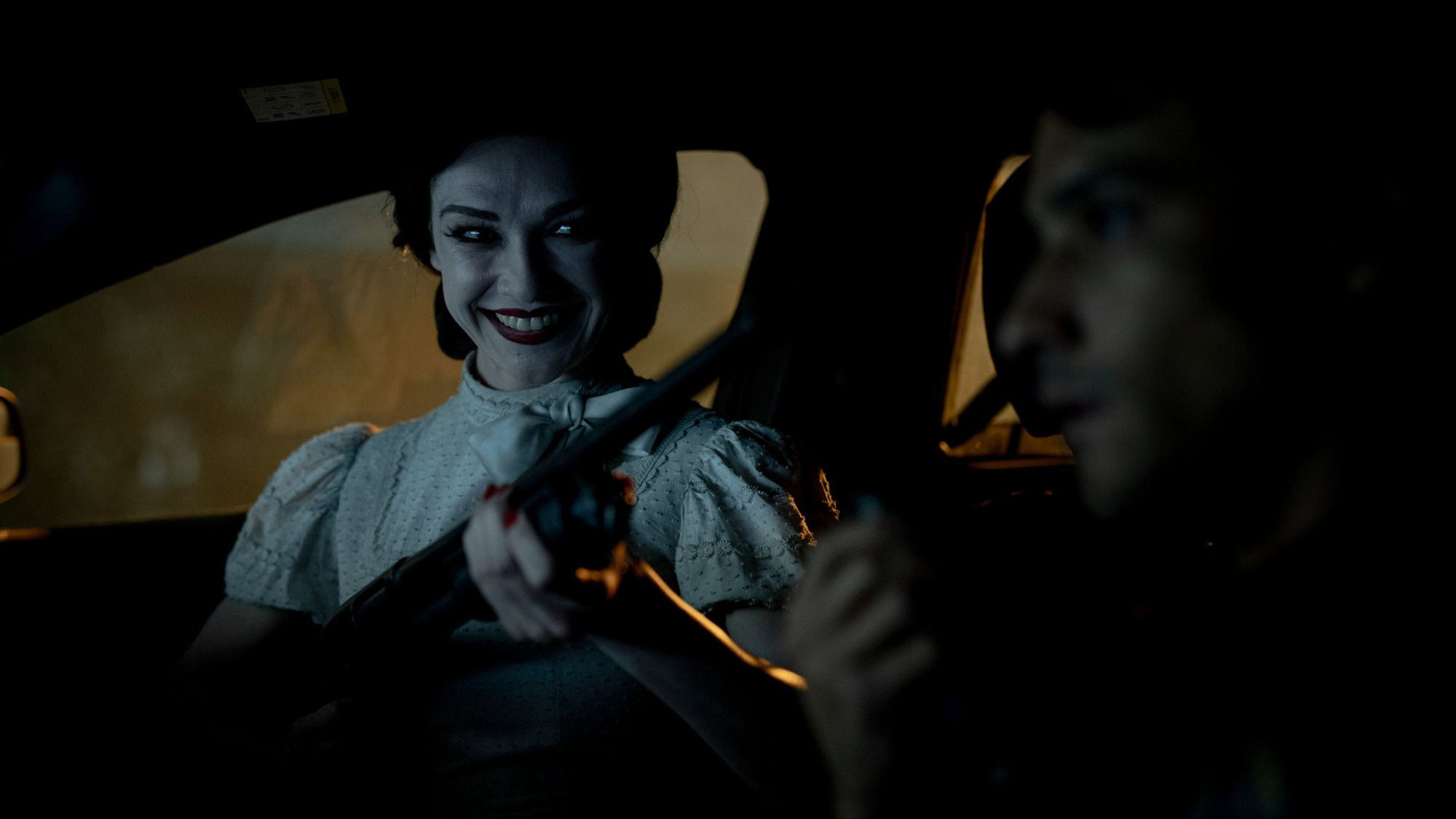 Smiling Woman with Shotgun in Insidious HD Wallpaper