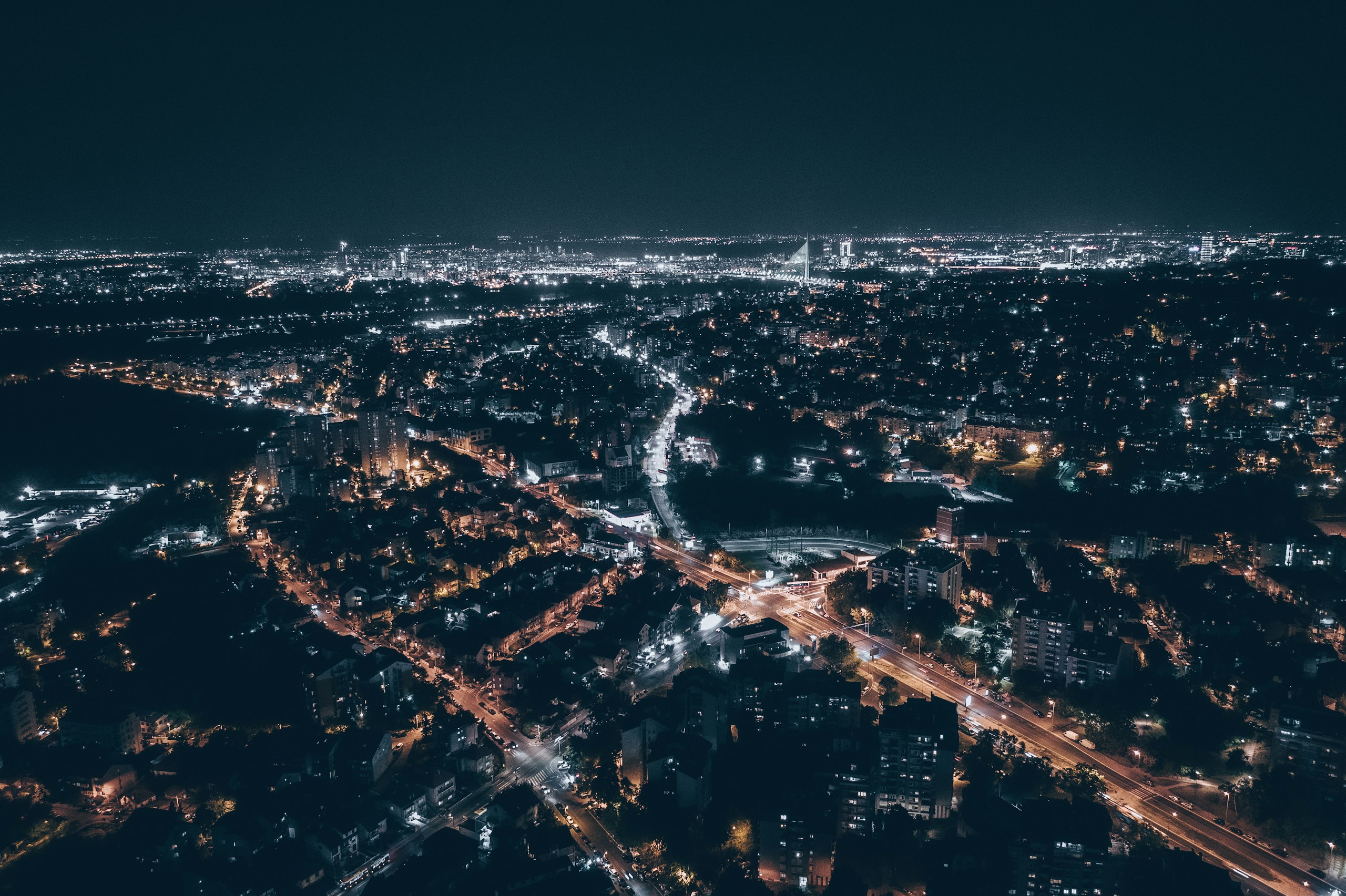 Aerial View of a City at Night HD Wallpaper