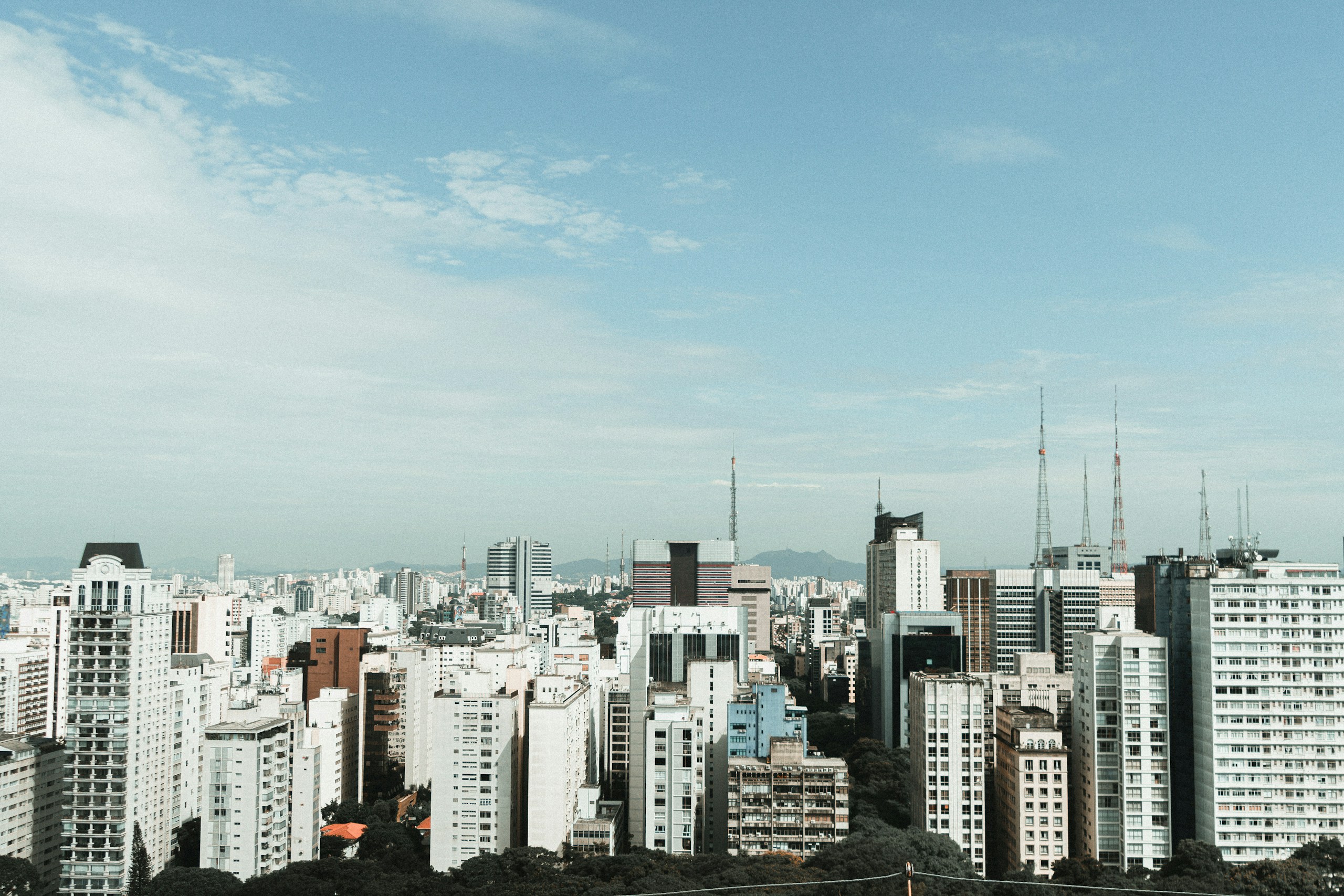 Dense City Skyline of São Paulo Under Blue Sky HD Wallpaper