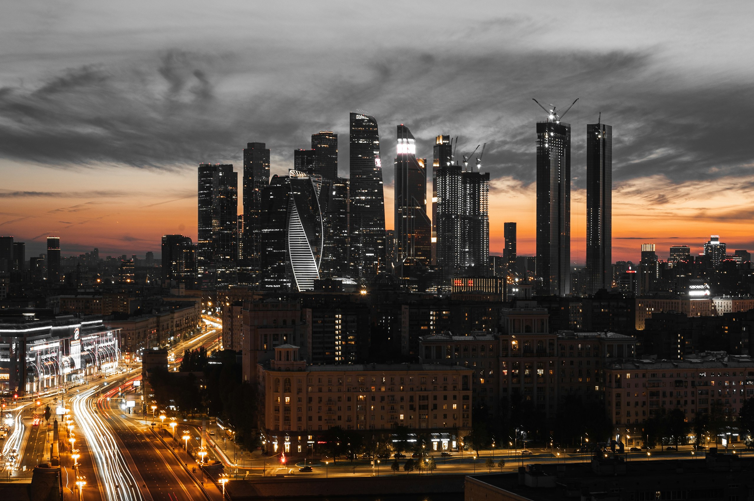 Moscow City Skyline at Sunset with Light Trails HD Wallpaper