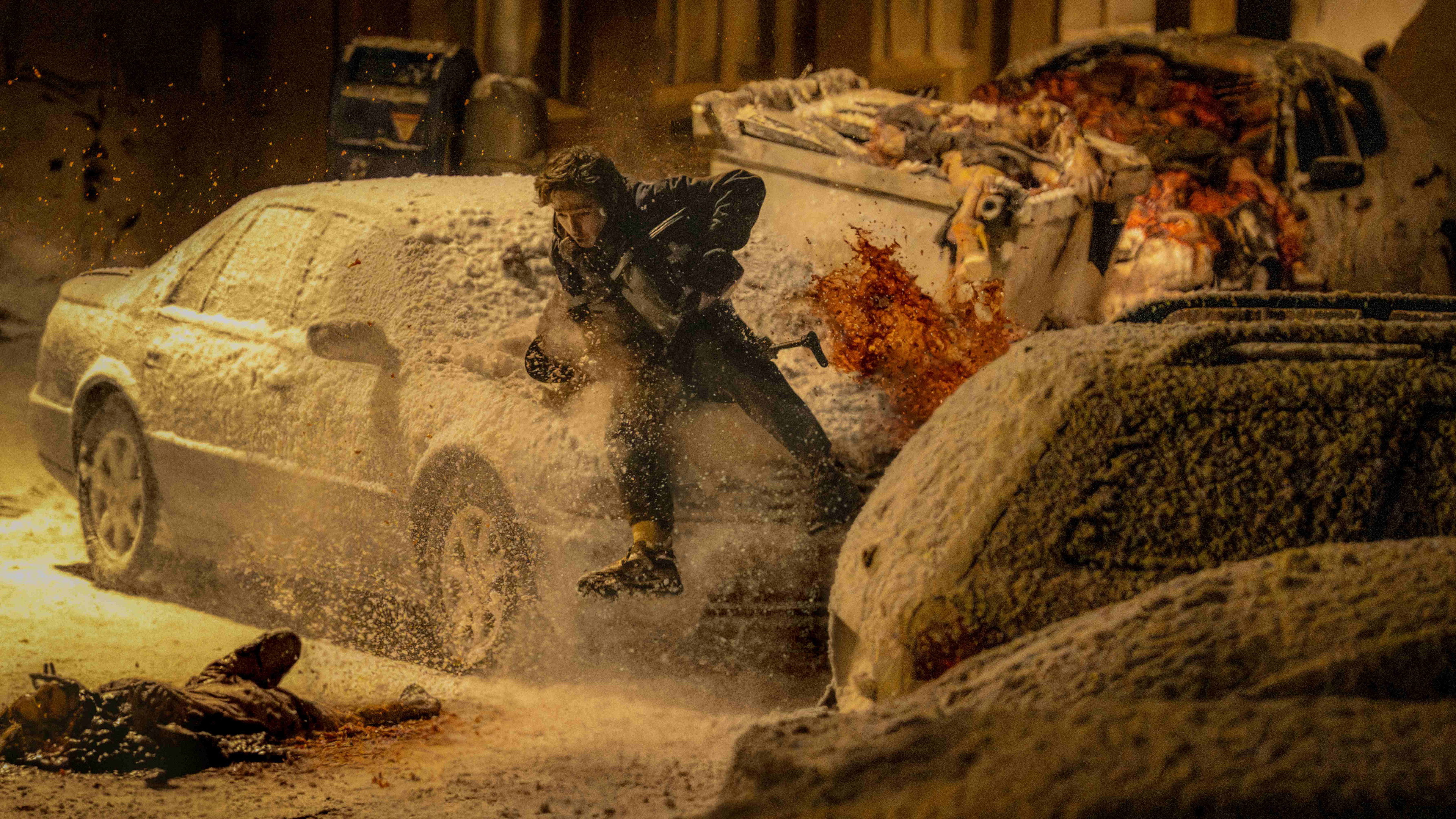 Action scene in a snowy street from Resident Evil HD Wallpaper