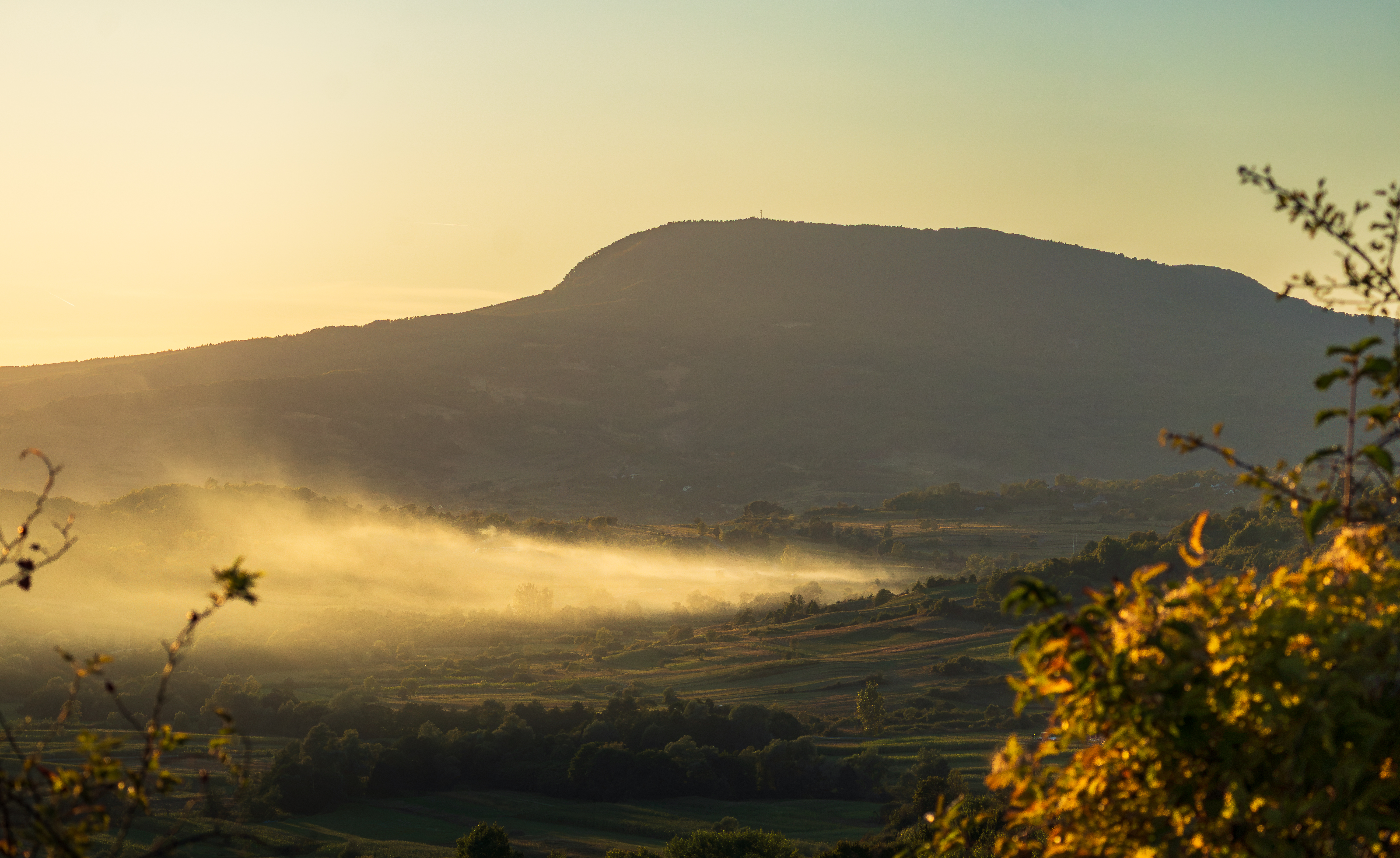 Misty Valley and Mountain at Golden Hour HD Wallpaper