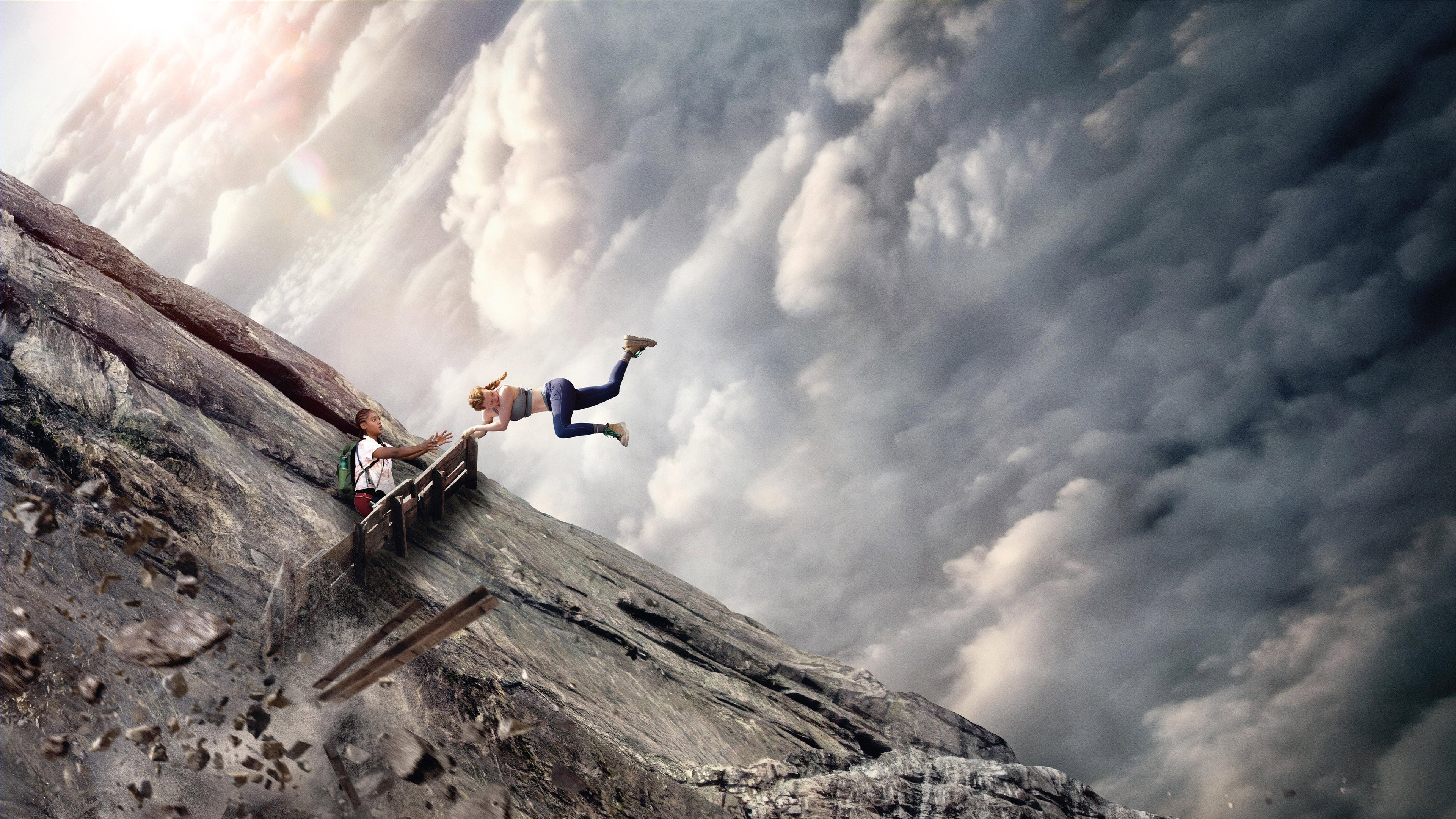 Woman falling from cliff, man reaching out HD Wallpaper
