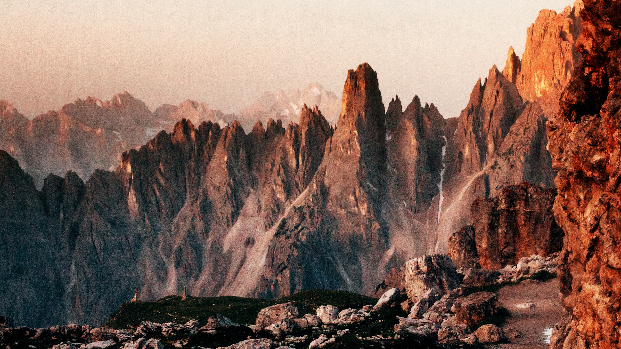 Jagged mountain peaks at sunset HD Wallpaper