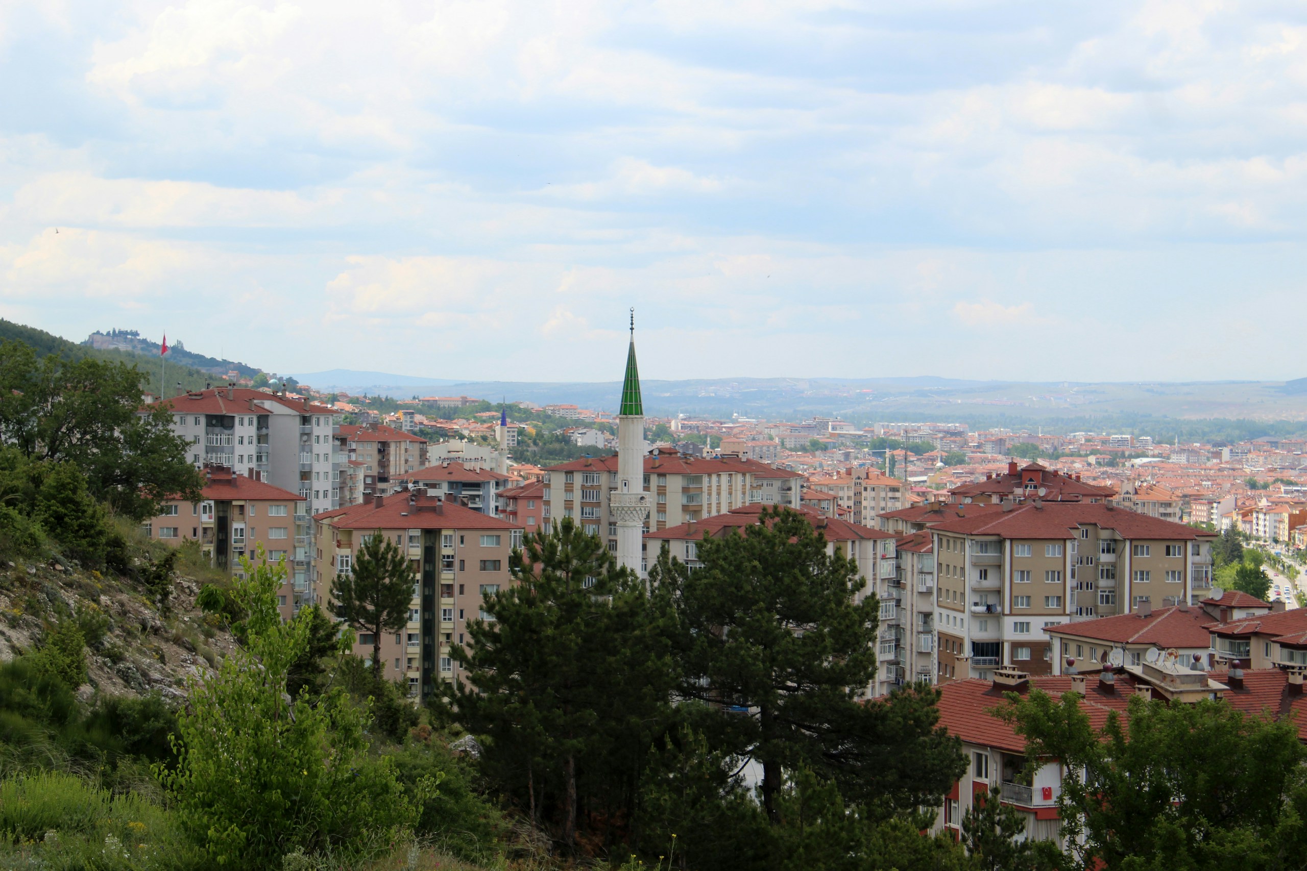 Cityscape with Mosque and Buildings on a Hill HD Wallpaper