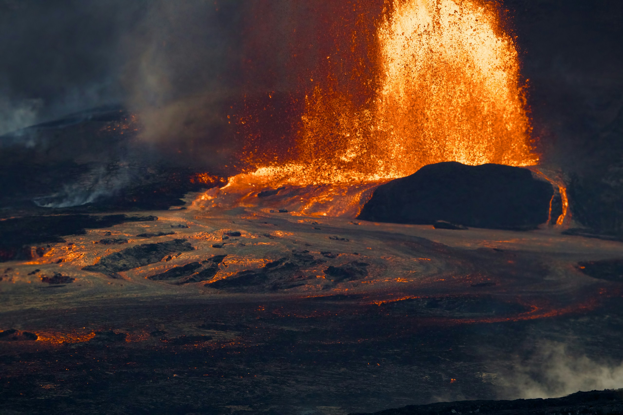 Volcano erupting with lava and smoke HD Wallpaper