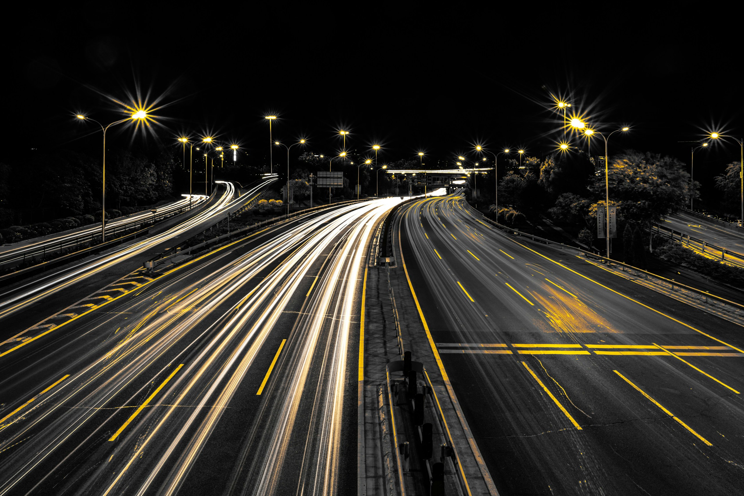 Highway light trails at night HD Wallpaper