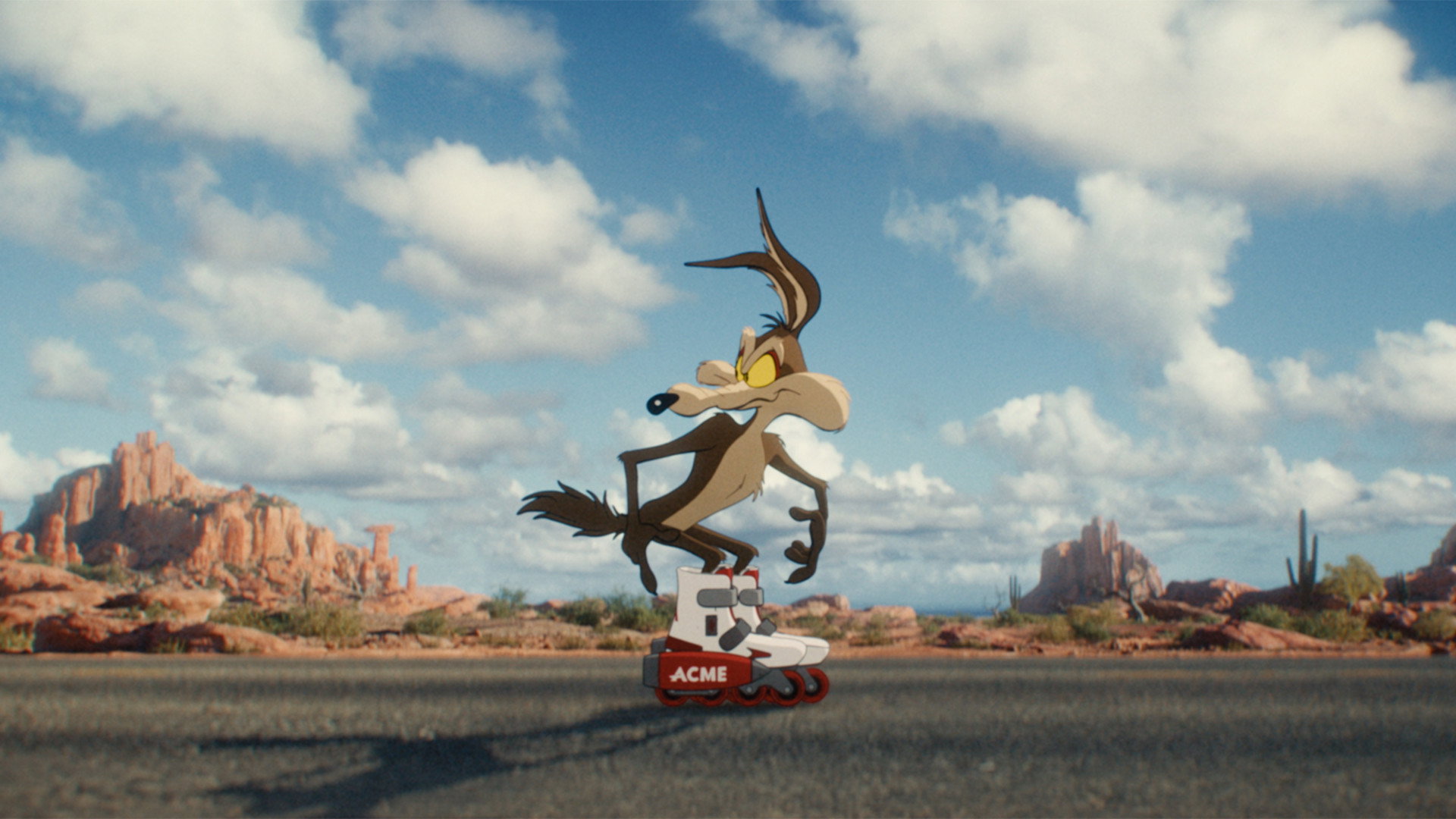 Wile E. Coyote on roller skates in the desert HD Wallpaper