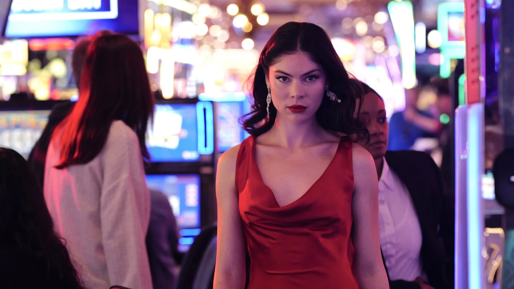 Woman in red dress in a casino HD Wallpaper