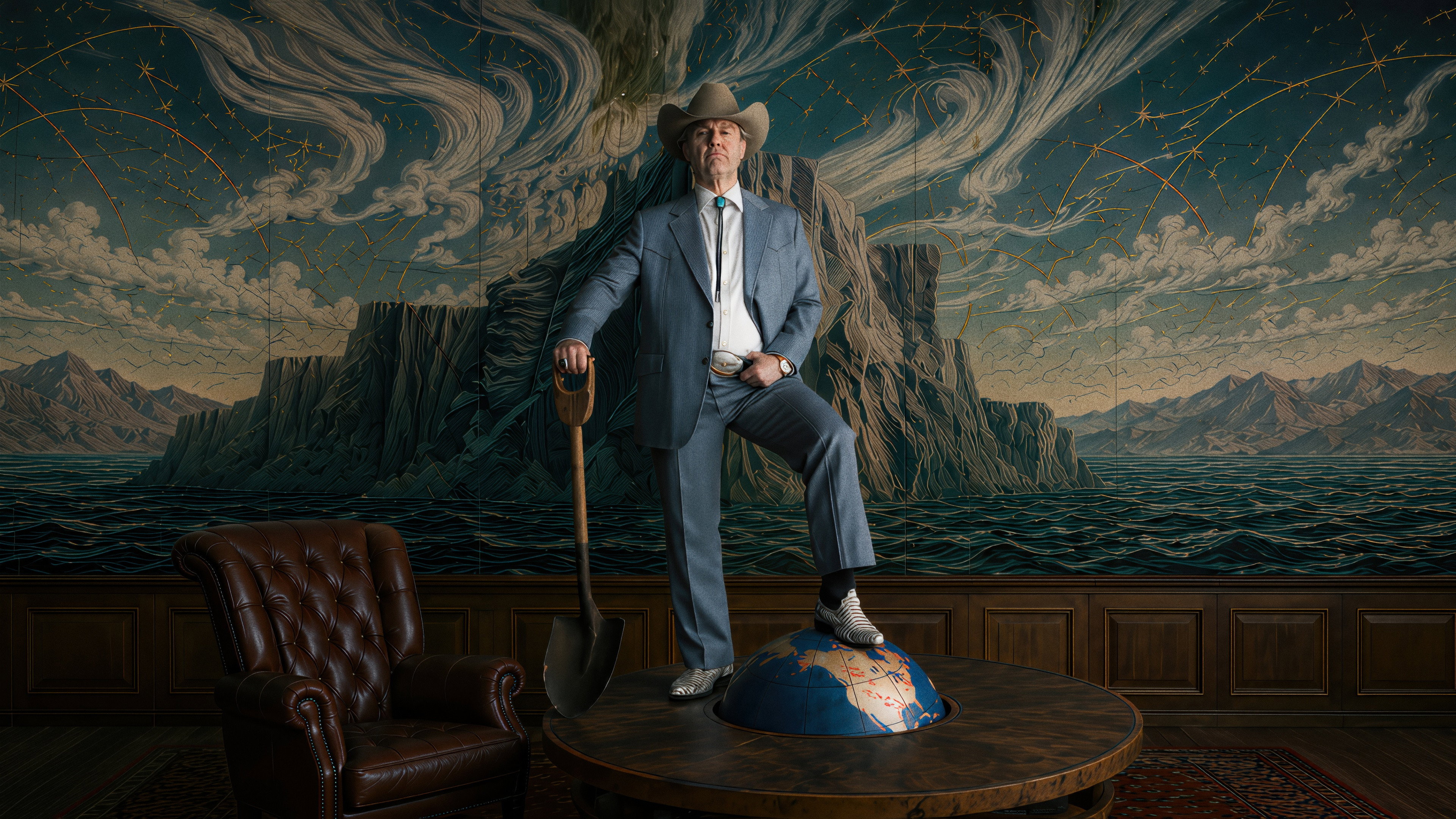 Man in Suit with Shovel Standing on Globe HD Wallpaper