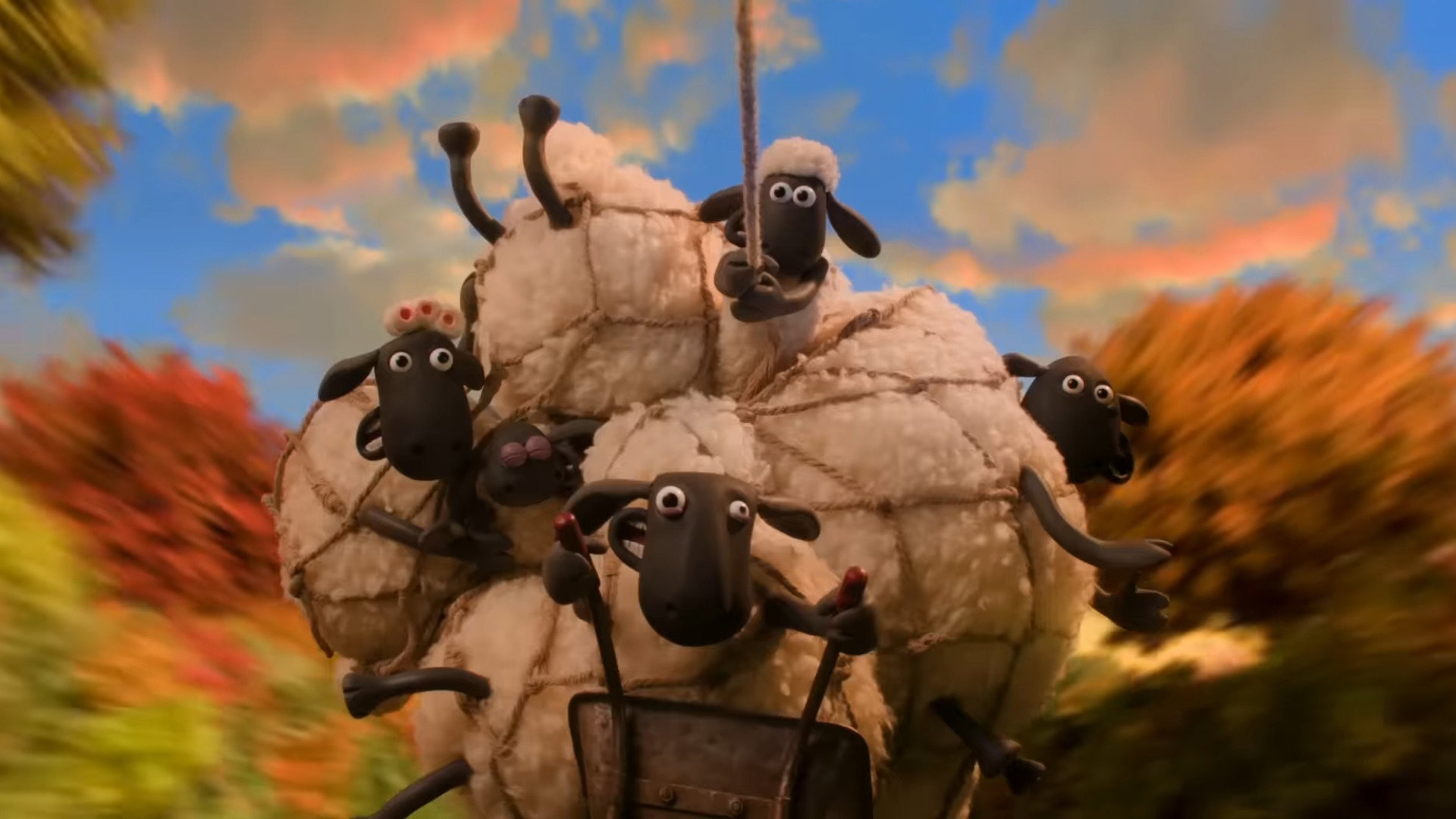 Shaun the Sheep and friends in a hay bale contraption HD Wallpaper